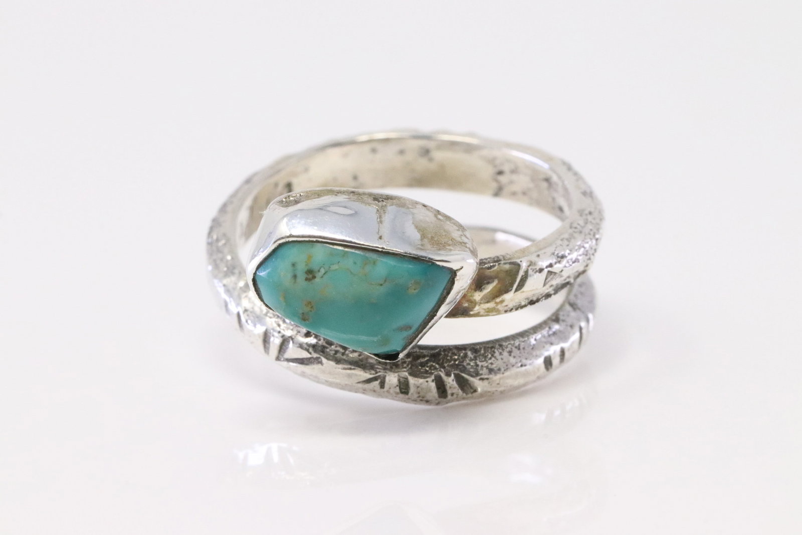 Native America Zuni Sterling Silver Turquoise Ring By Jude Delgarito.: This is a Native America Zuni Sterling Silver Turquoise Ring By Jude Delgarito. Ring size: 9.75.