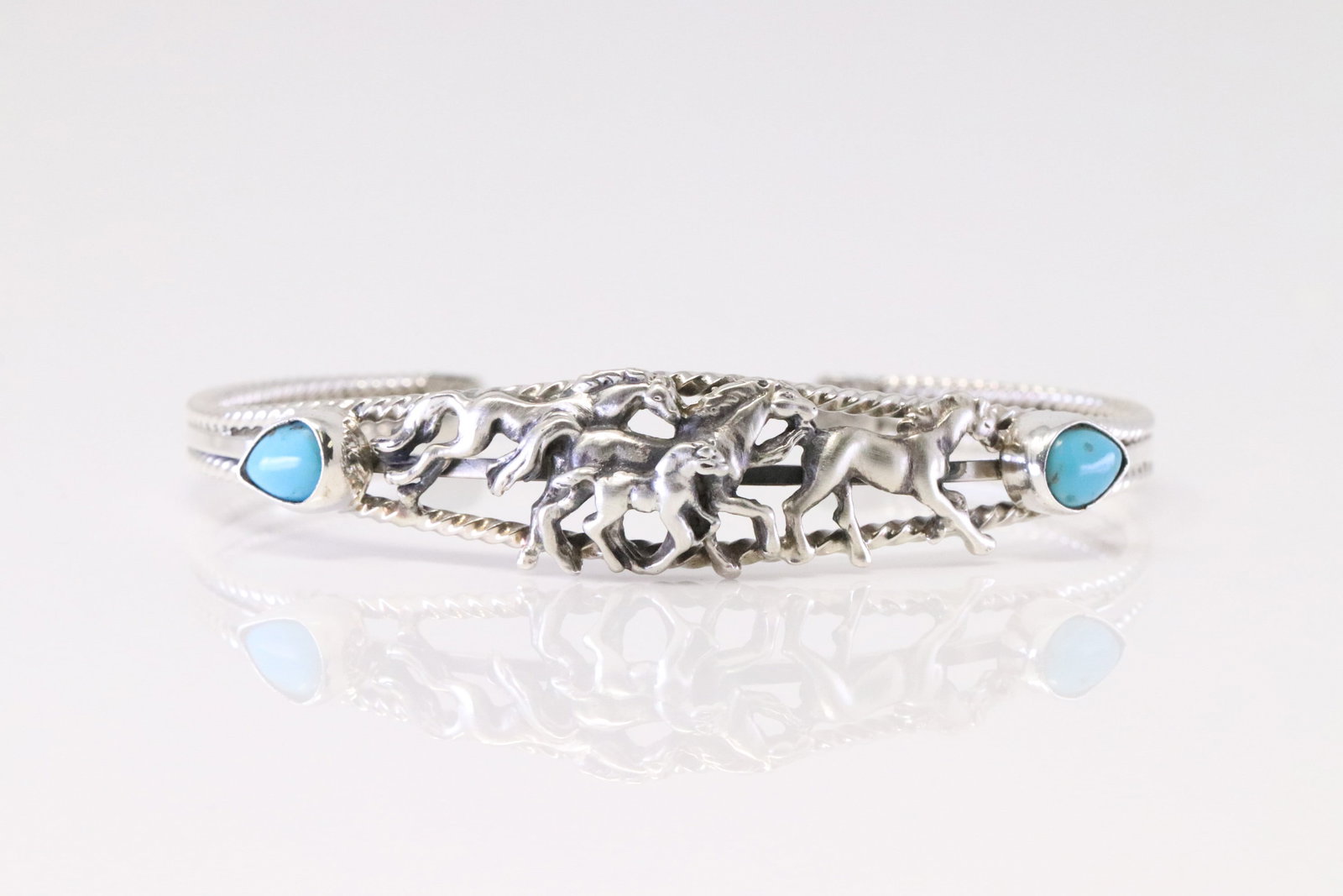 Native America Navajo Sterling Silver Turquoise Horse Bracelet Cuff By Bobby Platero.: This is a Native America Navajo Sterling Silver Turquoise Horse Bracelet Cuff By Bobby Platero.