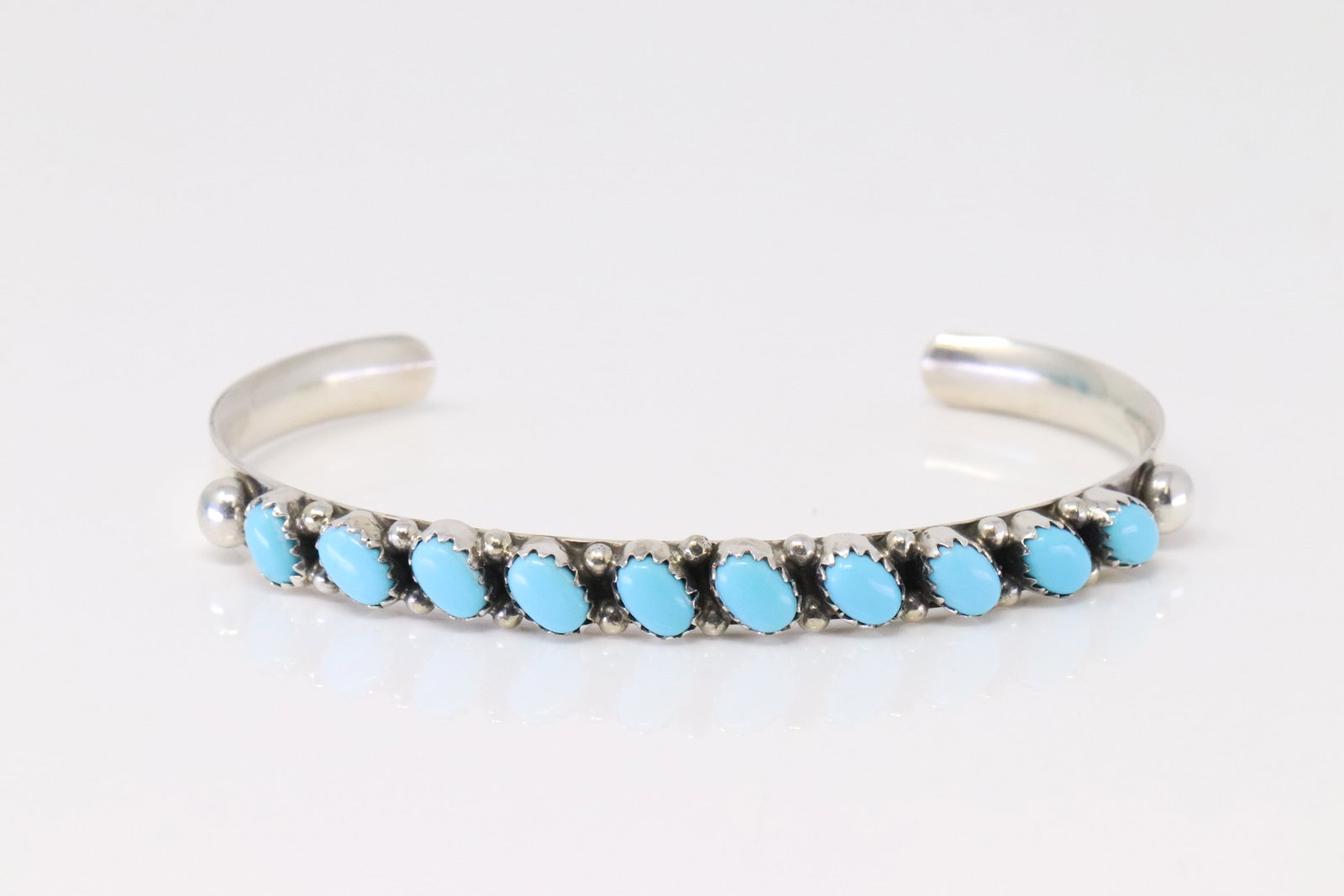 Native American Navajo Sterling Silver Kingman Turquoise Bracelet By Calvin James.: This is a Native American Navajo Sterling Silver Kingman Turquoise Bracelet By Calvin James.