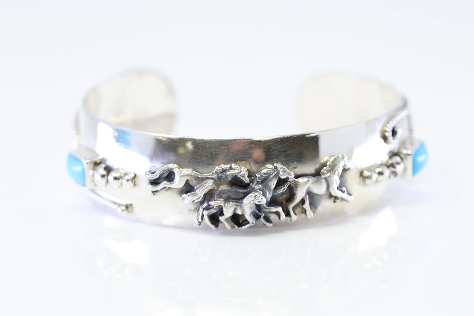 Native America Navajo Sterling Silver Turquoise Horse Bracelet Cuff By Bobby Platero.: This is a Native America Navajo Sterling Silver Turquoise Horse Bracelet Cuff By Bobby Platero.