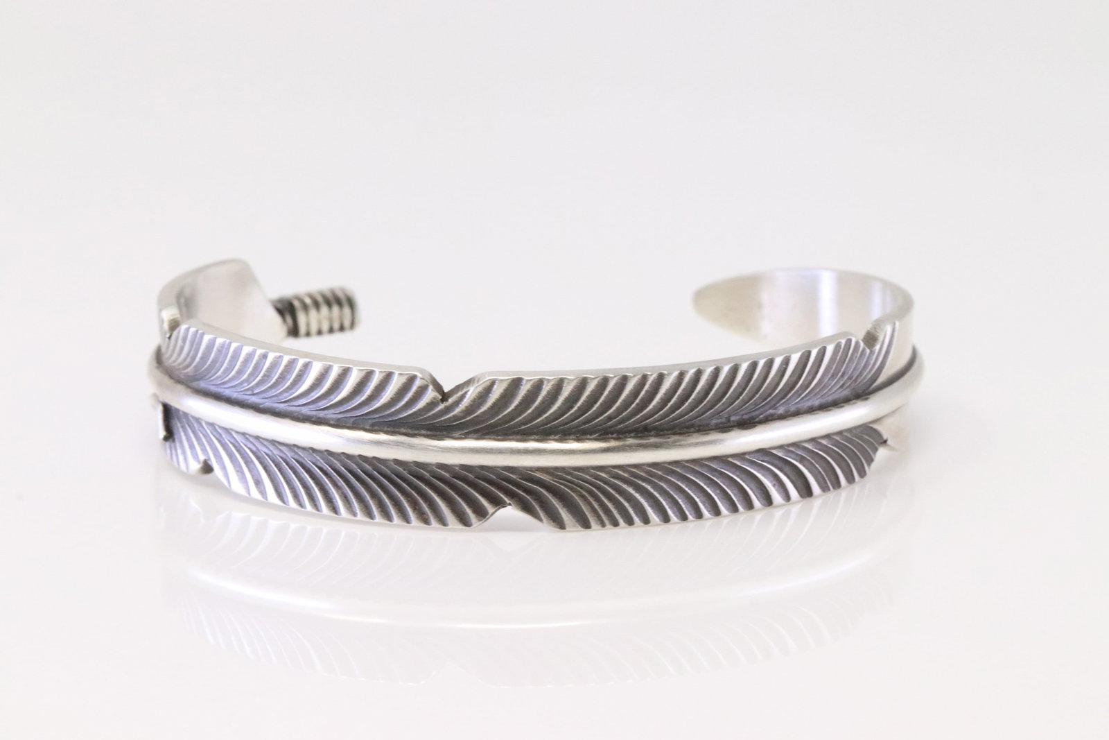 Native American Navajo Sterling Silver Feather Bracelet By Chris Charlie.: This is a Native American Navajo Sterling Silver Feather Bracelet By Chris Charlie.