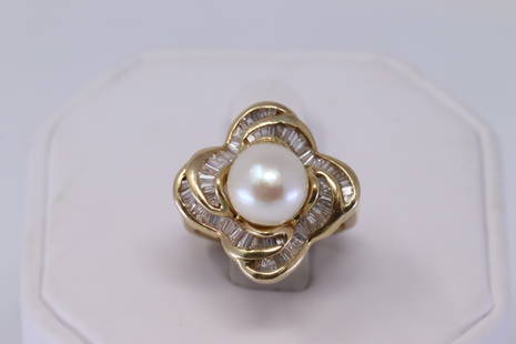 14K Yellow Gold Akoya Pearl with Diamonds: This is a Ladies 14k Gold ring with Appx 1 carat baguette diamonds. Akoya pearl in the center meaures 9mm. Ring size 5 3/4. Total weight 8.6 grams.