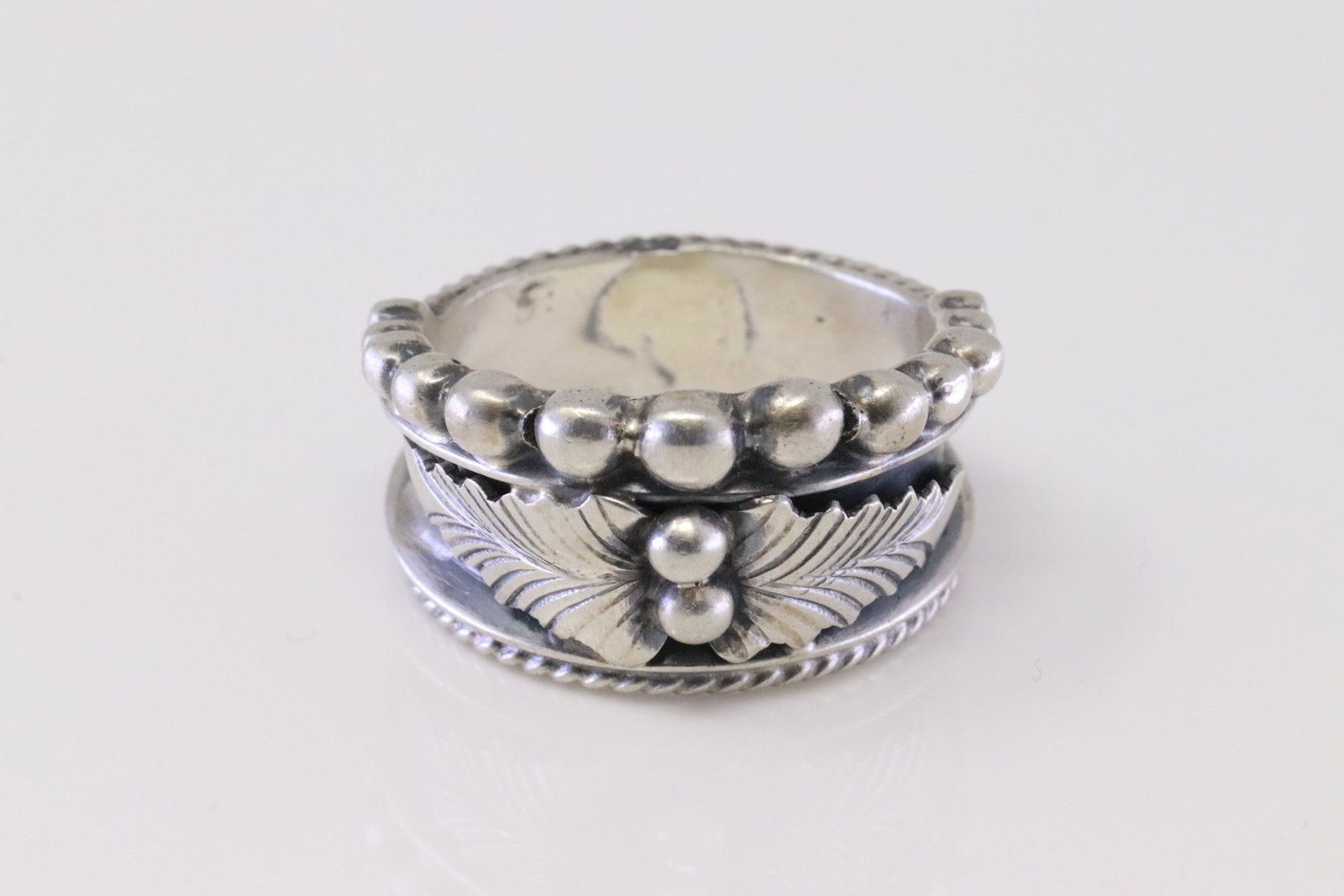 Native America Navajo Sterling Silver Ring By Tom Lewis.: This is a Native America Navajo Sterling Silver Ring By Tom Lewis. Ring size: 8.25.