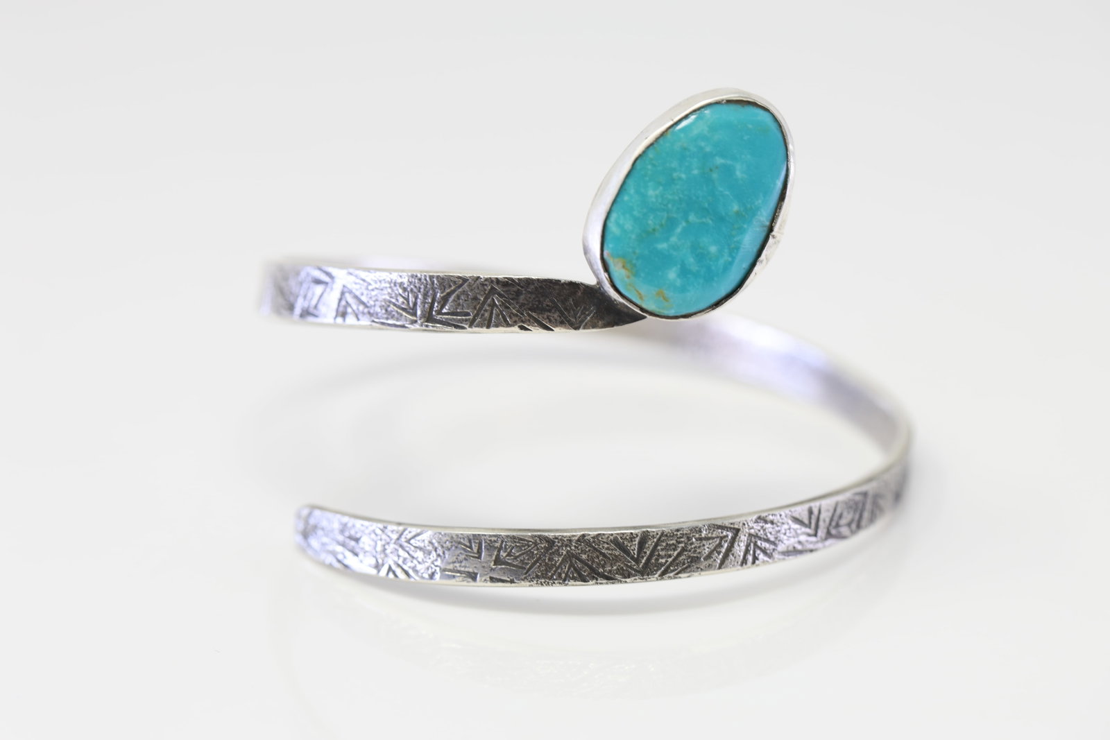 Native America Zuni Sterling Silver Turquoise Bracelet By Jude Delgarito.: This is a Native America Zuni Sterling Silver Turquoise Bracelet By Jude Delgarito.