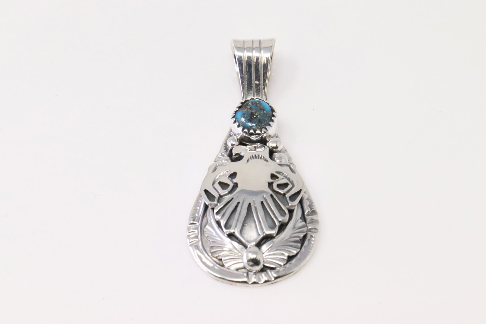 Native America Navajo Sterling Silver Turquoise Thunderbird Pendant By Henry Attakai.: This is a Native America Navajo Sterling Silver Turquoise Thunderbird Pendant By Henry Attakai.