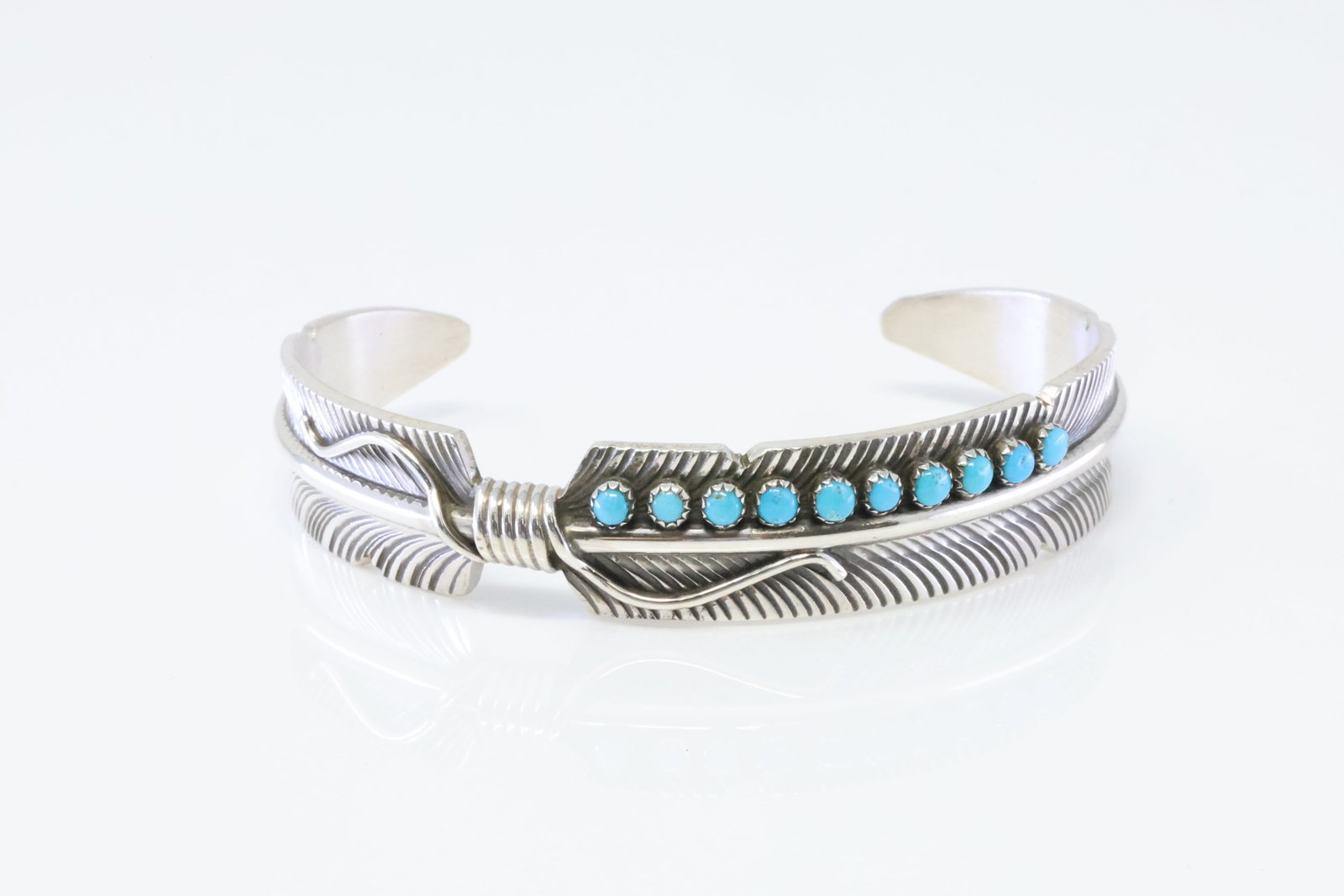 Native America Navajo Sterling Silver Turquoise Feather Bracelet By C.C.: This is a Native America Navajo Sterling Silver Turquoise Feather Bracelet By C.C.