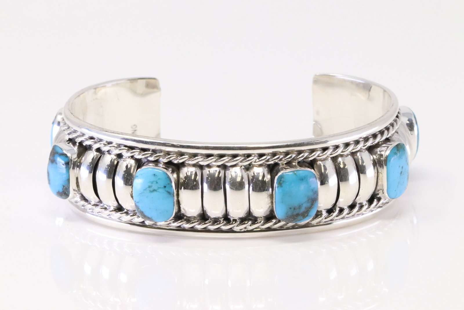 Native America Navajo Sterling Silver Turquoise Bracelet Cuff By Manuel Johnson.: This is a Native America Navajo Sterling Silver Turquoise Bracelet Cuff By Manuel Johnson.