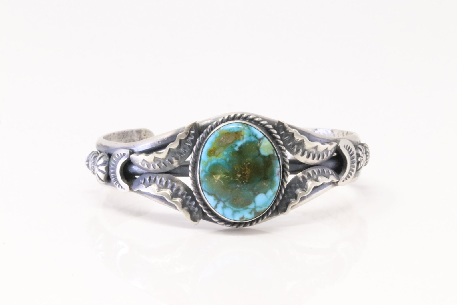 Native American Navajo Sterling Silver Turquoise Bracelet By Gilbert Tom.: This is a Native American Navajo Sterling Silver Turquoise Bracelet By Gilbert Tom.