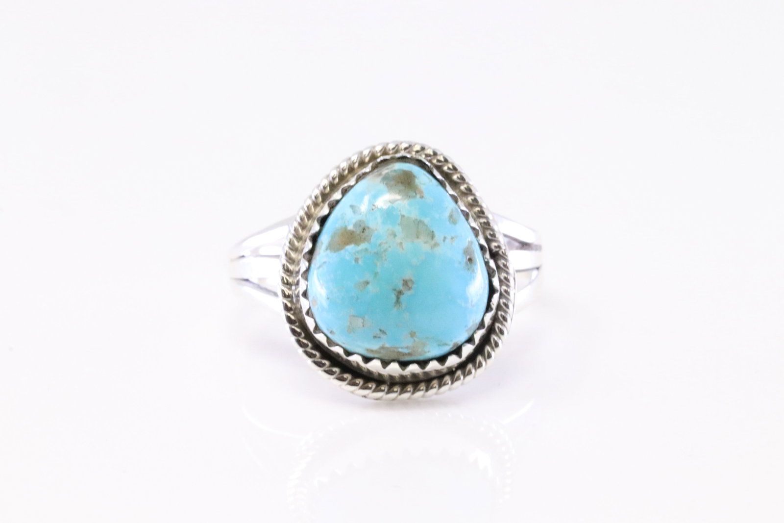 Native America Navajo Sterling Silver Turquoise Ring By Tom Dinetso.: This is a Native America Navajo Sterling Silver Turquoise Ring By Tom Dinetso. Ring size: 8.25.
