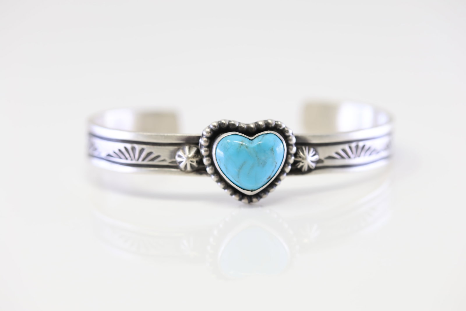 Native America Navajo Sterling Silver Kingman Turquoise Heart Bracelet Cuff By Rick Enriquez.: This is a Native America Navajo Sterling Silver Kingman Turquoise Heart Bracelet Cuff By Rick Enriquez.