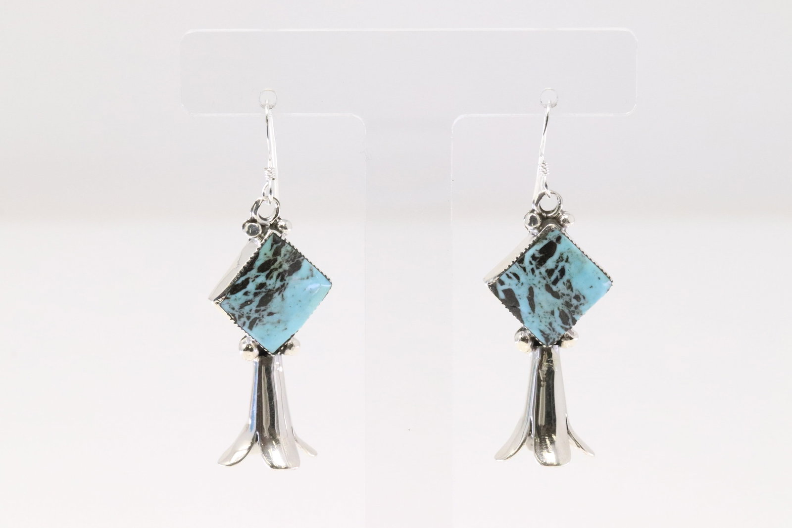 Native America Navajo Sterling Silver Turquoise Blossom Dangling Earring's Suzanna Johnson.: This is a Native America Navajo Sterling Silver Turquoise Blossom Dangling Earring's Suzanna Johnson.