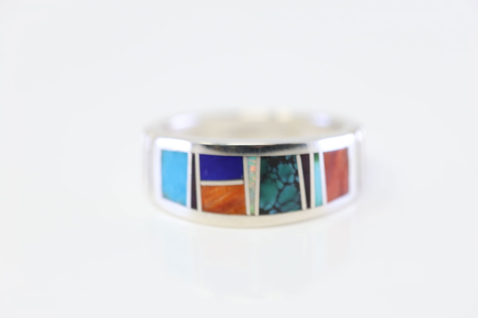 Native American Navajo Sterling Silver Multi-Color Inlay Ring By Rick.: This is a Native American Navajo Sterling Silver Multi-Color Inlay Ring By Rick. Ring size: 10.25.