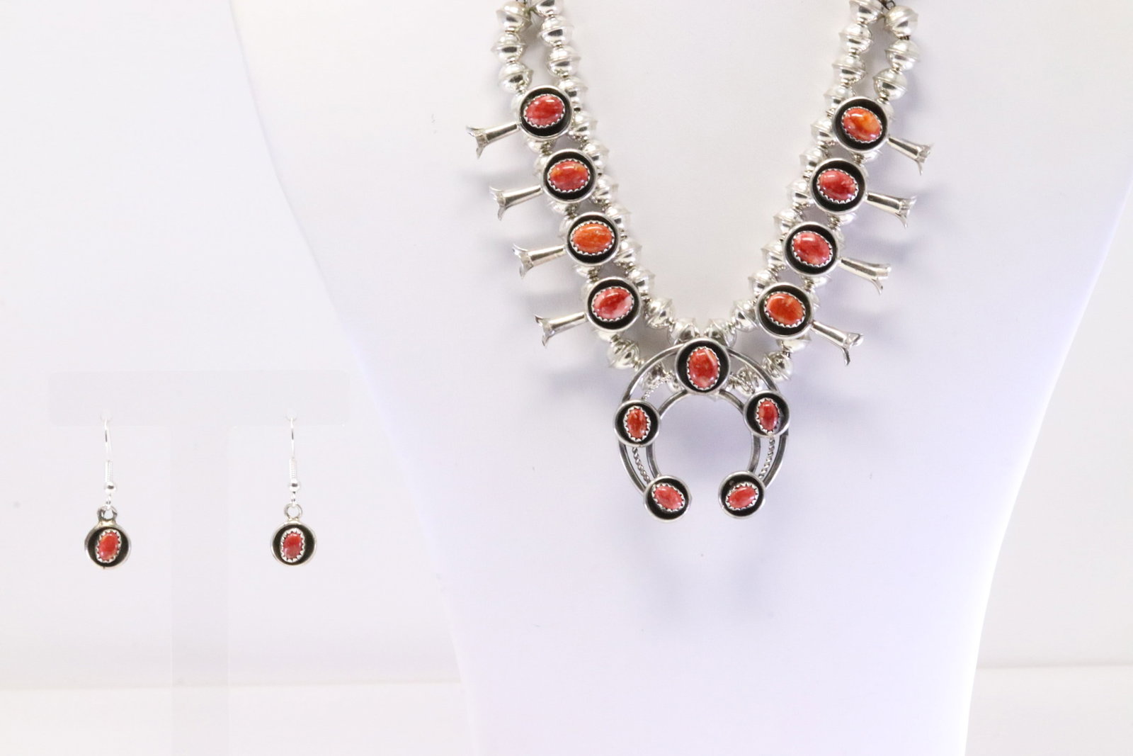 Native America Navajo Sterling Silver Coral Baby Squash Blossom Necklace & Earring's Set By P.G.: This is a Native America Navajo Sterling Silver Coral Baby Squash Blossom Necklace & Earring's Set By P.G. Necklace length: 18.00"
