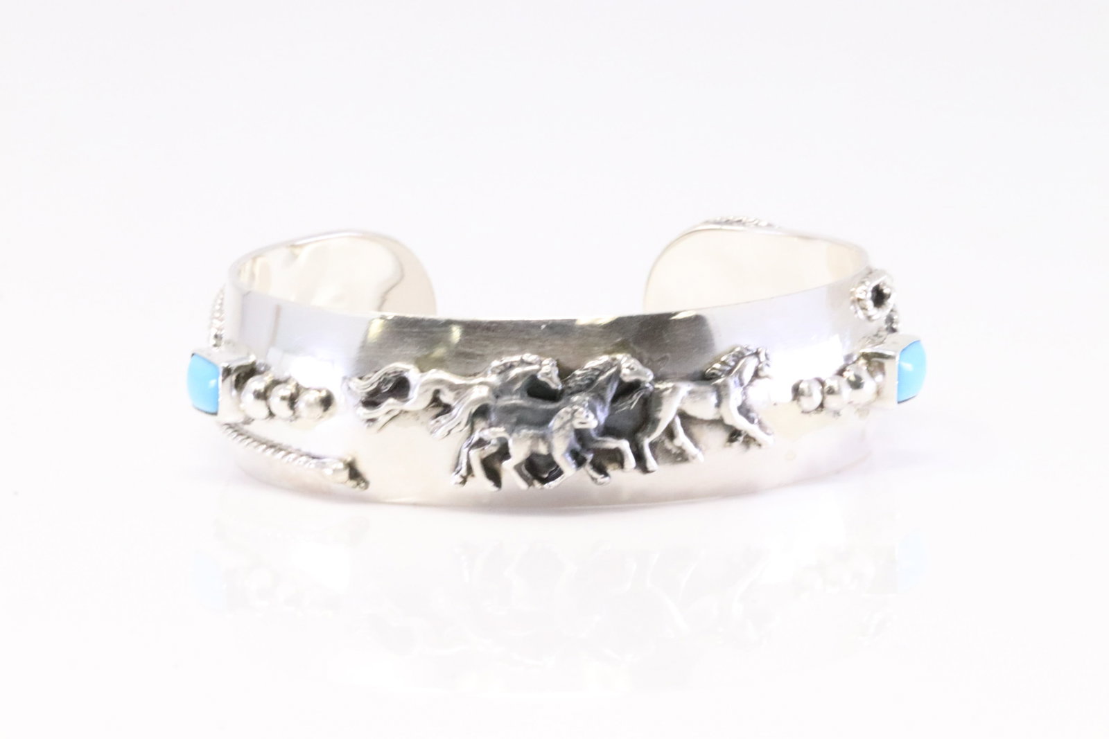Native America Navajo Sterling Silver Turquoise Horse Bracelet Cuff By Bobby Platero.: This is a Native America Navajo Sterling Silver Turquoise Horse Bracelet Cuff By Bobby Platero.