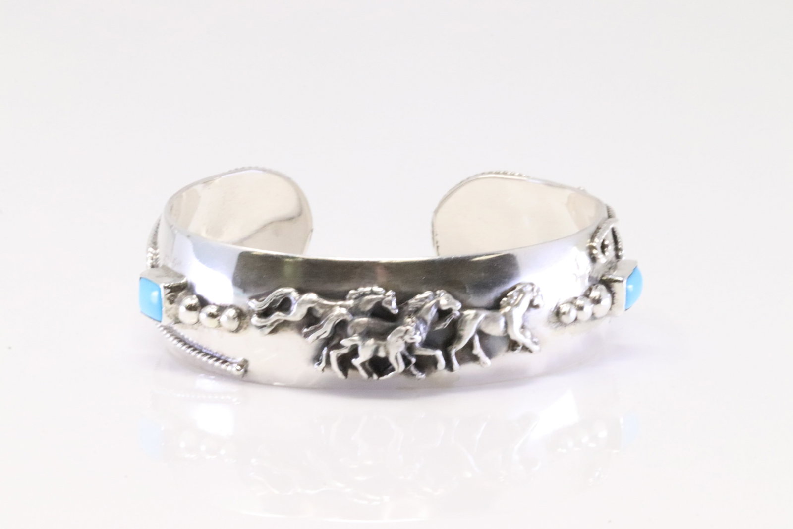Native America Navajo Sterling Silver Turquoise Horse Bracelet Cuff By Bobby Platero.: This is a Native America Navajo Sterling Silver Turquoise Horse Bracelet Cuff By Bobby Platero.