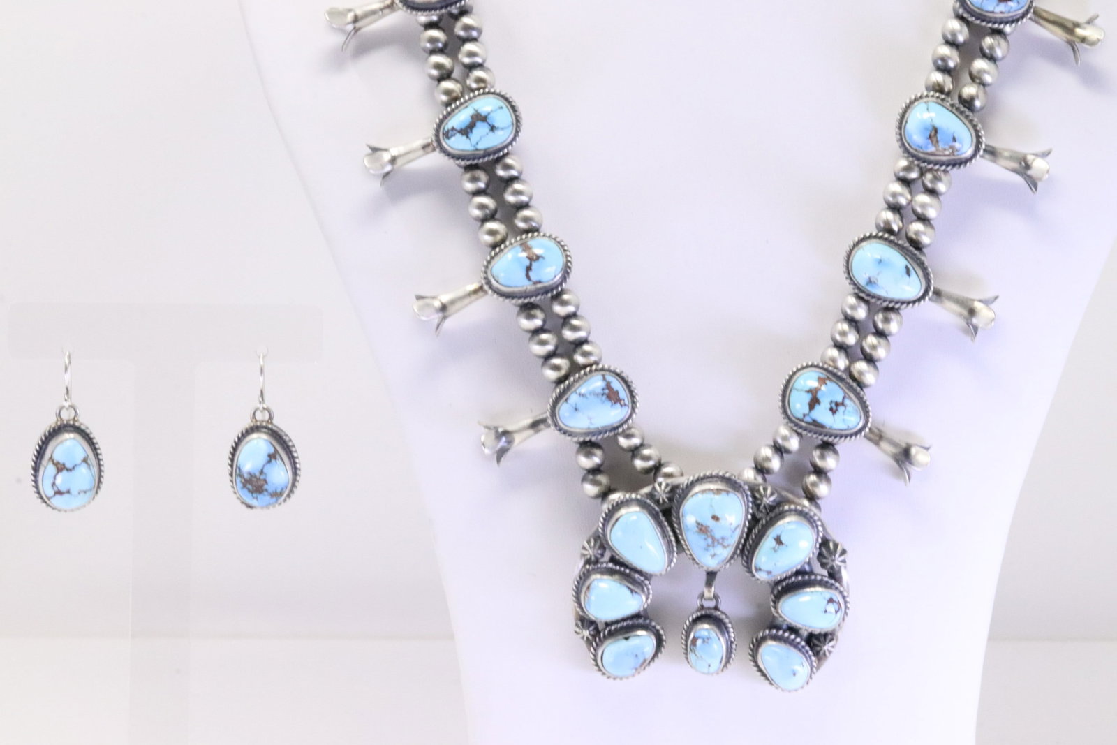 Native American Navajo Sterling Silver Golden Hill Turquoise Squash Blossom Necklace & Earring's Set: This is a Native American Navajo Sterling Silver Golden Hill Turquoise Squash Blossom Necklace & Earring's Set By Thomas Francisco. Necklace length: 24.00" Total weight: 140.30 Grams.