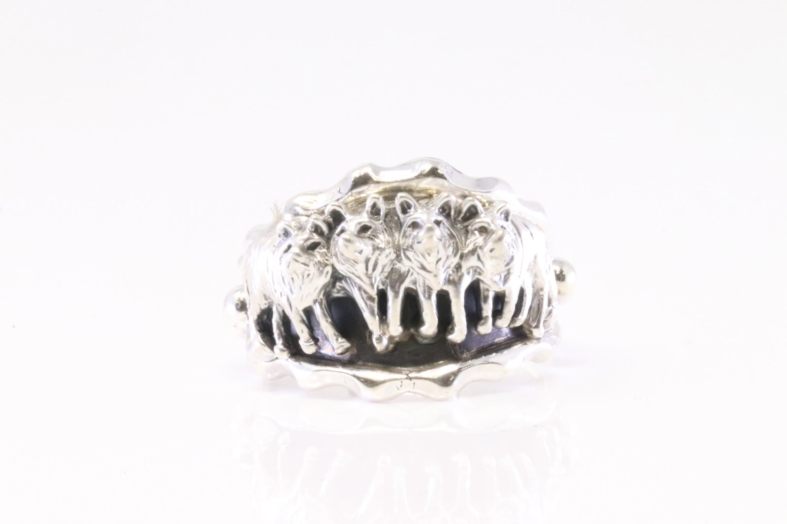 Native America Navajo Sterling Silver Wolf Pack Ring By Genevieve Francisco.: This is a Native America Navajo Sterling Silver Wolf Pack Ring By Genevieve Francisco. Ring size: 10.75.