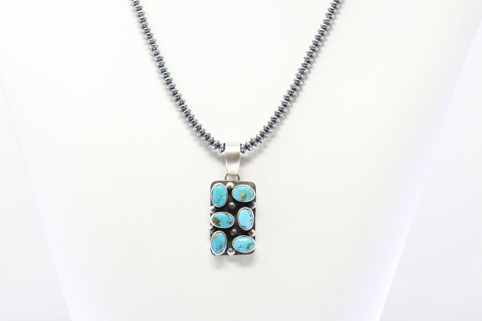 Native America Navajo Sterling Silver Kingman Turquoise Pendant By Betty Tom With Beaded Sterling: This is a Native America Navajo Sterling Silver Kingman Turquoise Pendant By Betty Tom With Beaded Sterling Silver Machine Made Necklace. Necklace length: 18.00"