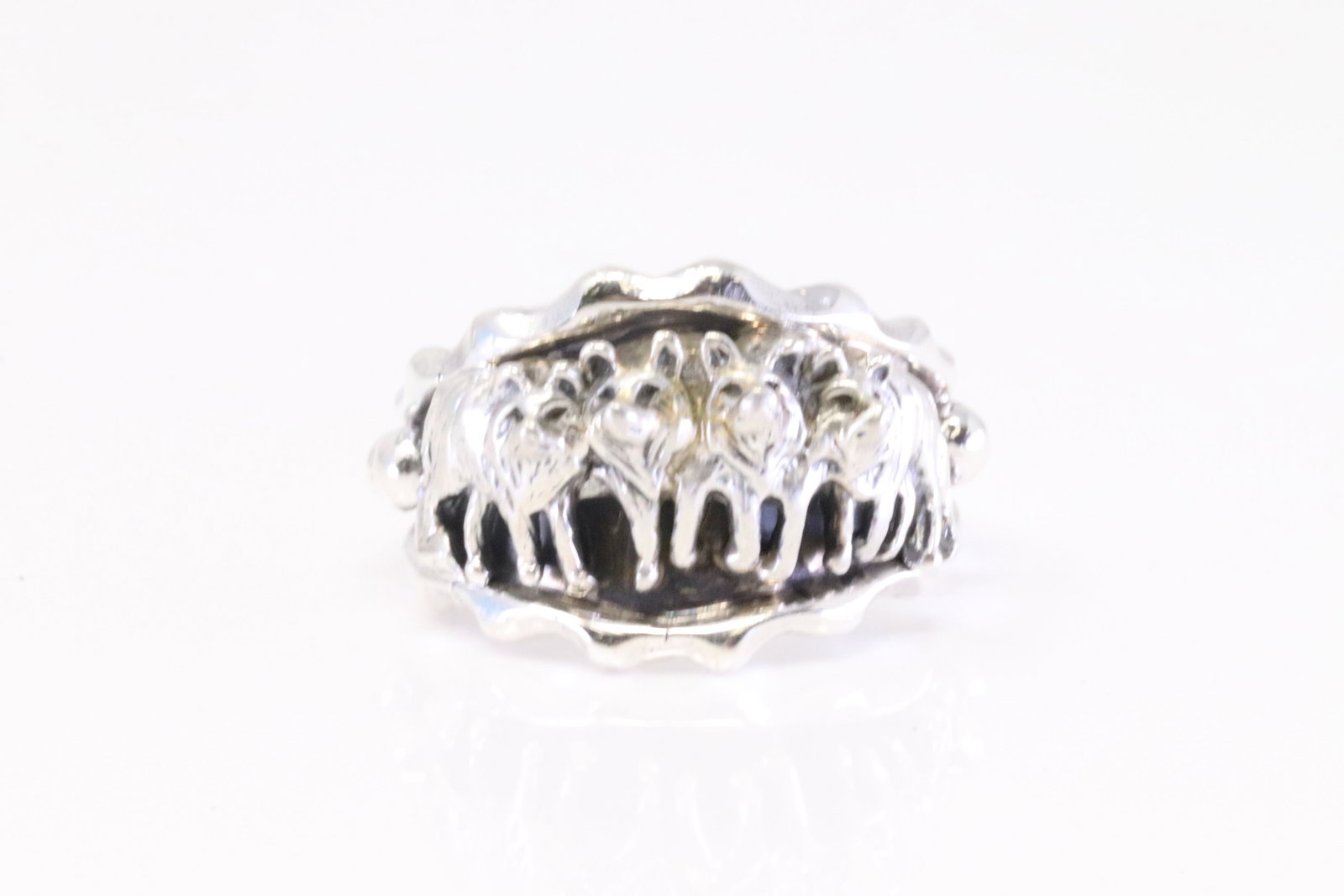 Native America Navajo Sterling Silver Wolf Pack Ring By Genevieve Francisco.: This is a Native America Navajo Sterling Silver Wolf Pack Ring By Genevieve Francisco. Ring size: 11.50.