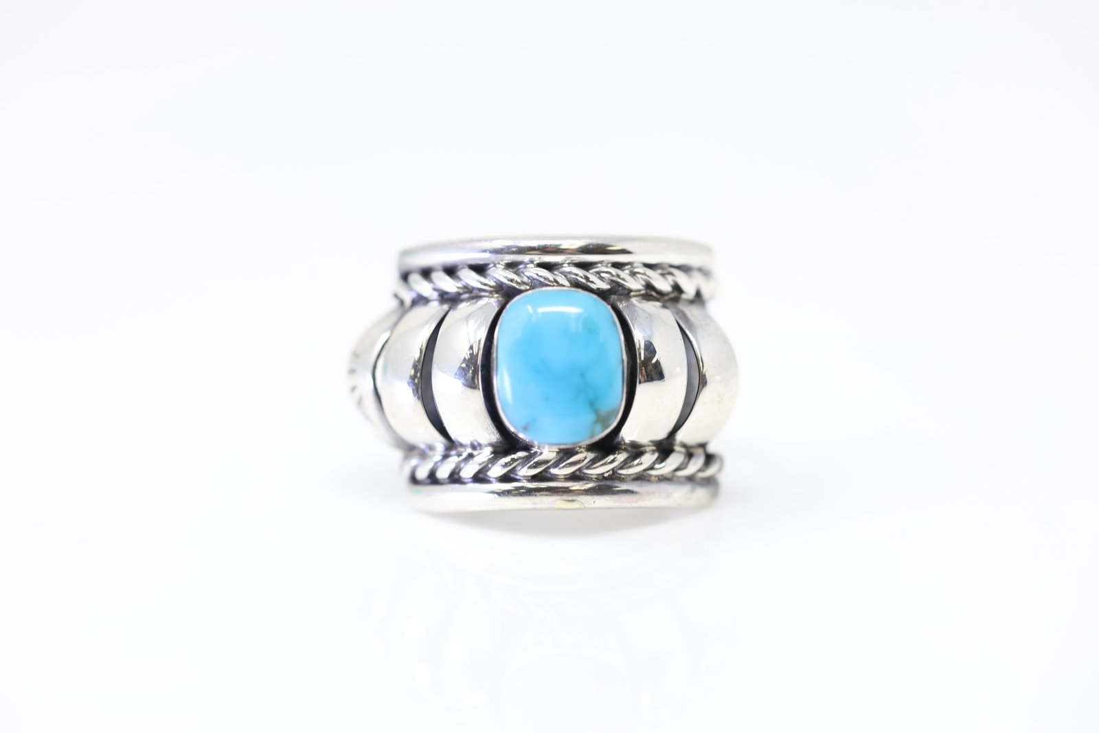 Native America Navajo Sterling Silver Turquoise Ring By Manuel Johson.: This is a Native America Navajo Sterling Silver Turquoise Ring By Manuel Johson. Ring size: 7.25.