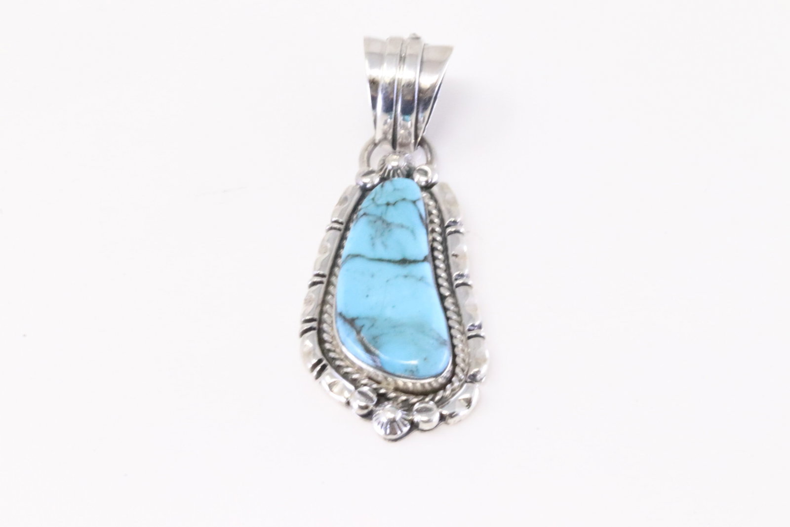 Native America Navajo Sterling Silver Turquoise Pendant By Kiriza Tom.: This is a Native America Navajo Sterling Silver Turquoise Pendant By Kiriza Tom.