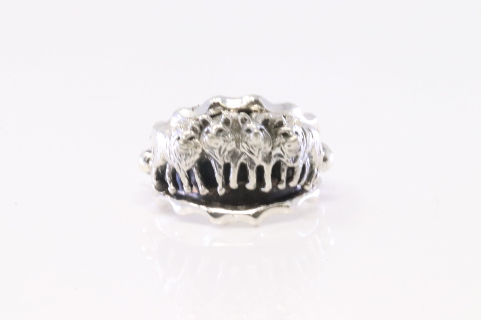 Native America Navajo Sterling Silver Wolf Pack Ring By Genevieve Francisco.: This is a Native America Navajo Sterling Silver Wolf Pack Ring By Genevieve Francisco. Ring size: 9.75.