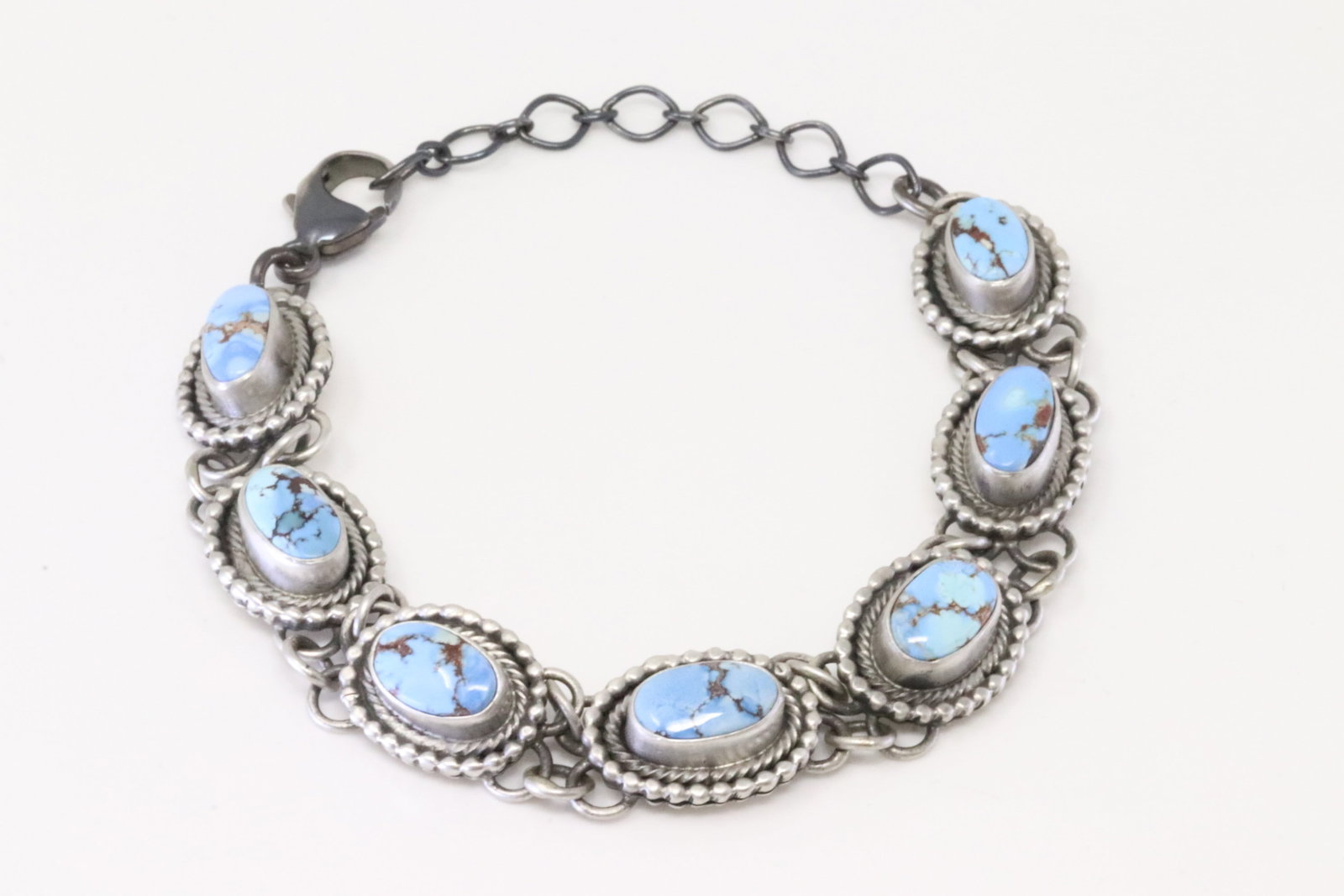 Native America Navajo Sterling Silver Golden Hill Turquoise Bracelet Link By Betty Tom.: This is a Native America Navajo Sterling Silver Golden Hill Turquoise Bracelet Link By Betty Tom. Bracelet length: 9.00" Adjustable.