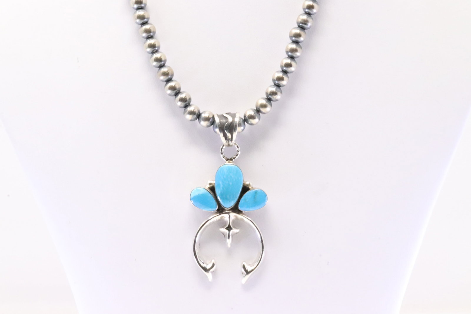 Native America Navajo Sterling Silver Turquoise Pendant By Irvin Tsosie. With Pearl Beaded Sterling: This is a Native America Navajo Sterling Silver Turquoise Pendant By Irvin Tsosie. With Pearl Beaded Sterling Silver Machine Made Necklace. Necklace length: 16.00"