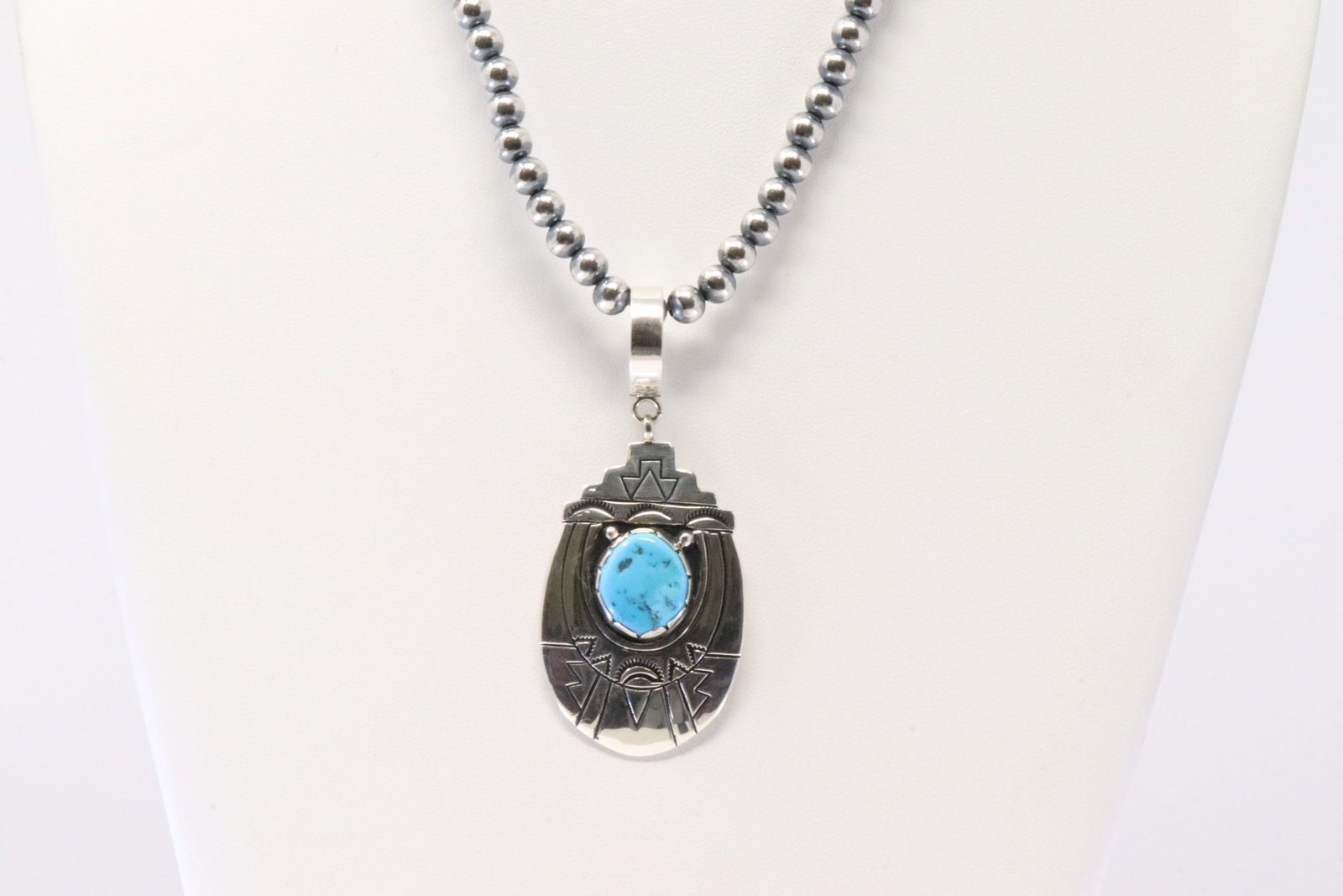 Native America Navajo Sterling Silver Turquoise Pendant By T&R Singer. With Pearl Beaded Sterling: This is a Native America Navajo Sterling Silver Turquoise Pendant By T&R Singer. With Pearl Beaded Sterling Silver Machine Made Necklace. Necklace length: 18.00"