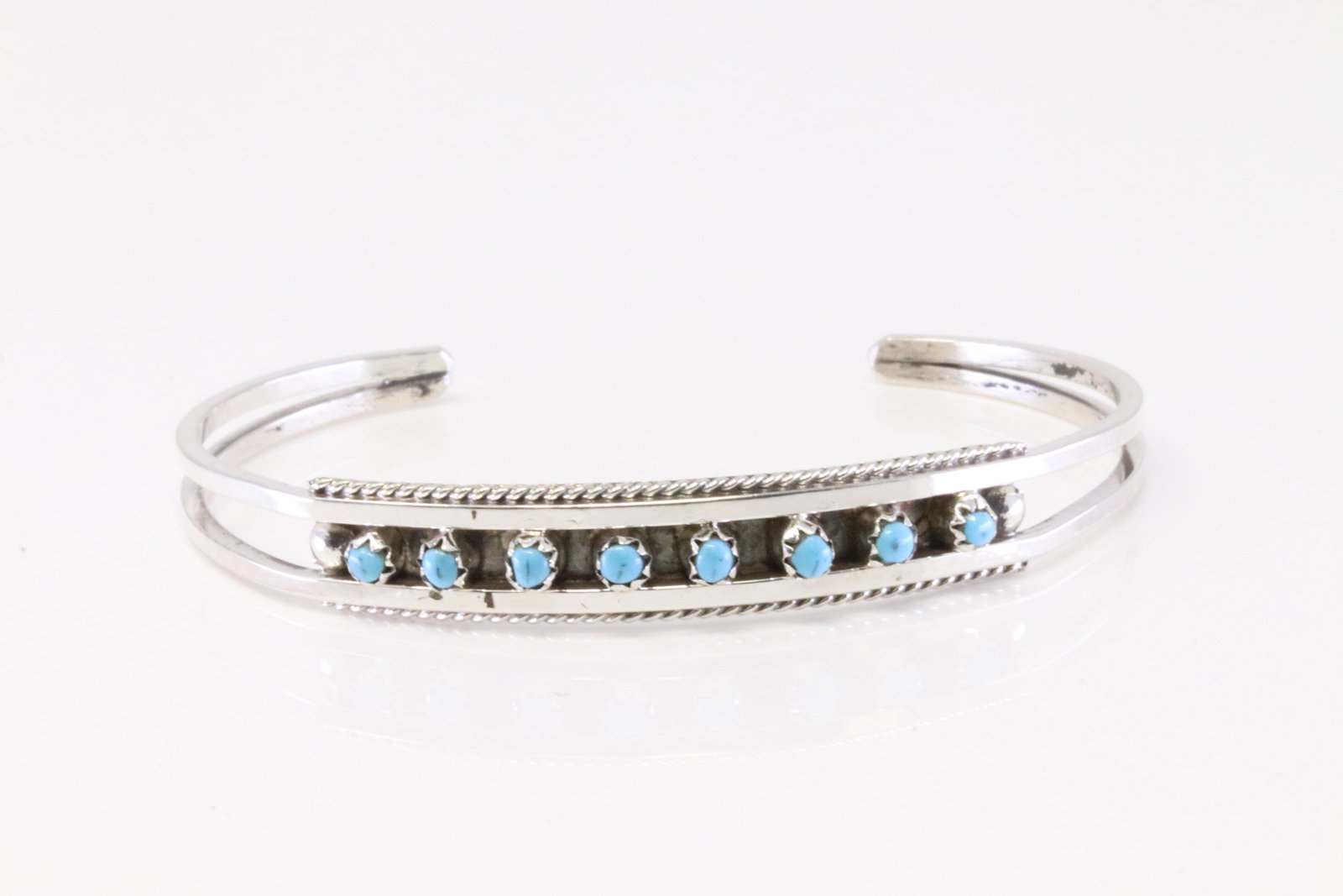 Native America Zuni Sterling Silver Turquoise Bracelet By S.L.: This is a Native America Zuni Sterling Silver Turquoise Bracelet By S.L.