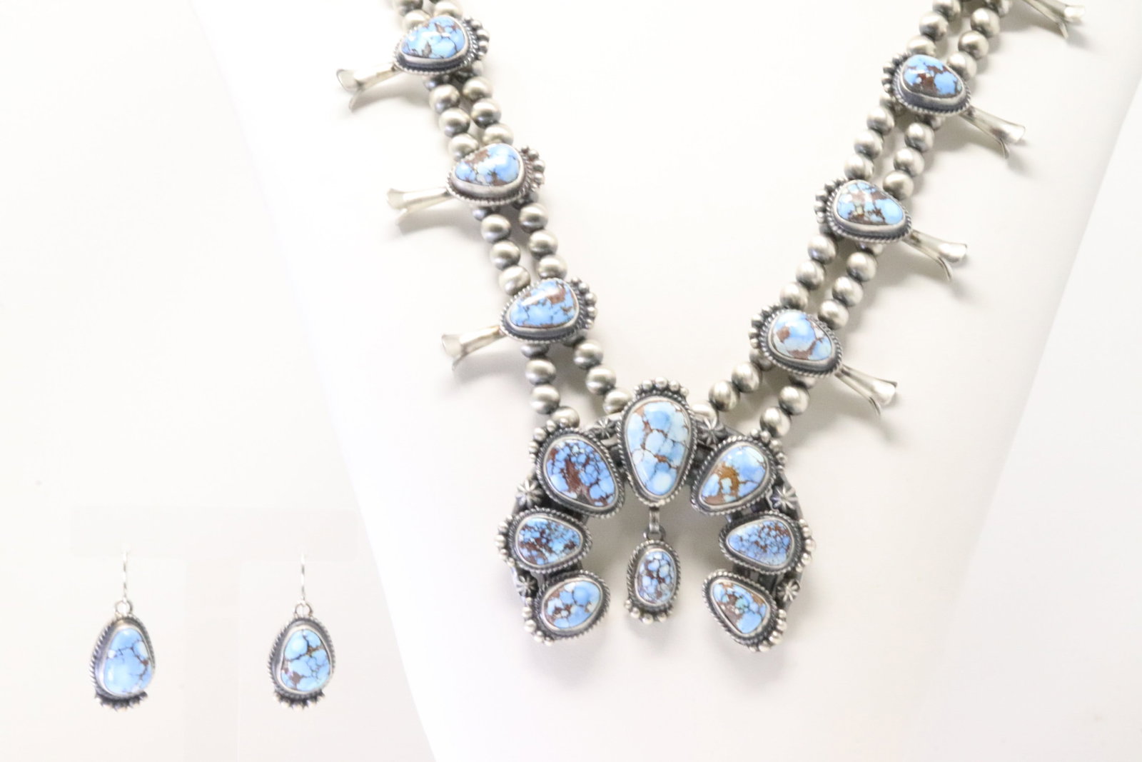 Native America Navajo Sterling Silver Golden Hill Turquoise Squash Blossom Necklace & Earring's Set: This is a Native America Navajo Sterling Silver Golden Hill Turquoise Squash Blossom Necklace & Earring's Set By Thomas Francisco. Necklace length: 28.00" Total weight: 167.10 Grams.