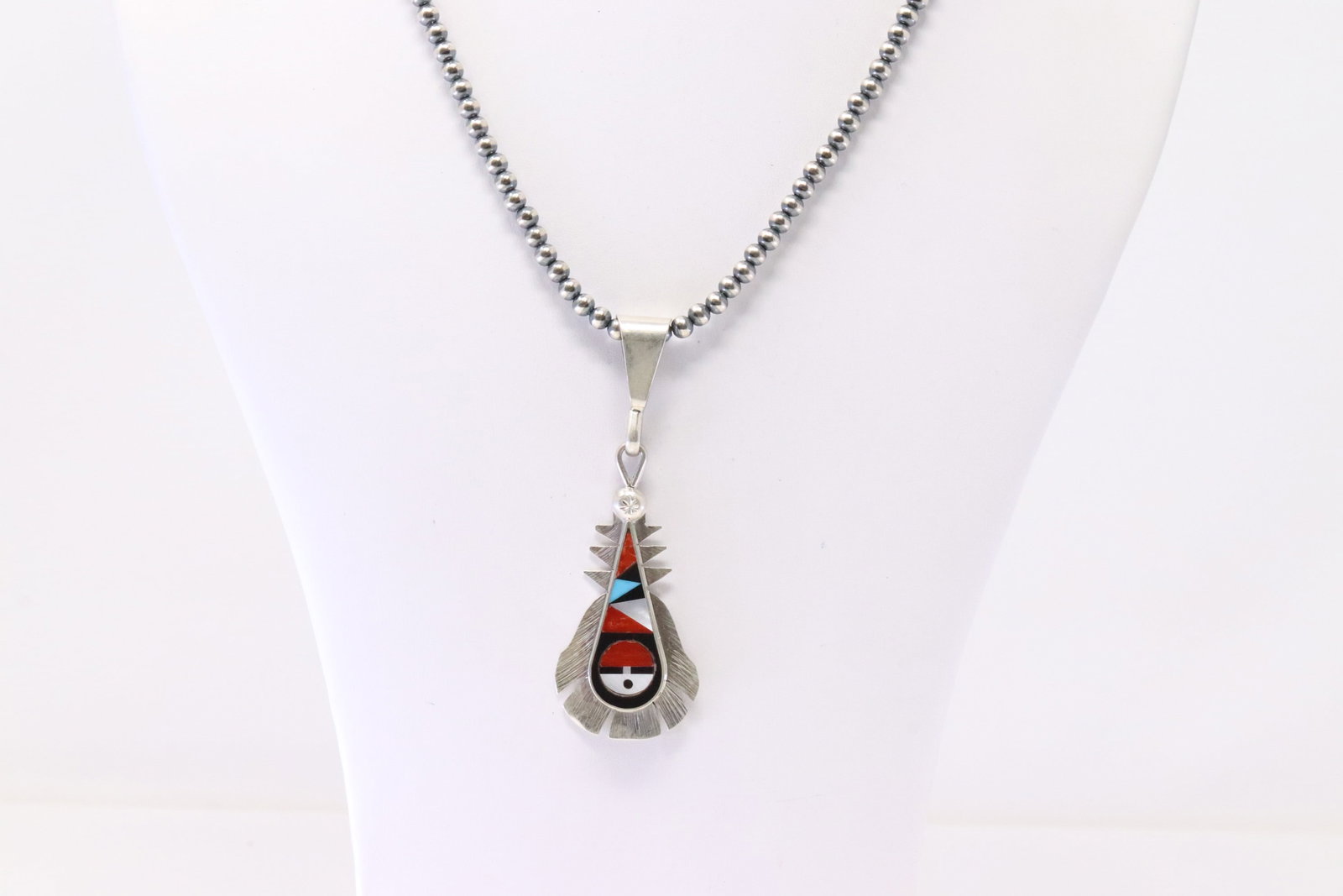Native America Zuni Sterling Silver Multi-color Inlay Pendant By R.L.Vacit. With Pearl Beaded: This is a Native America Zuni Sterling Silver Multi-color Inlay Pendant By R.L.Vacit. With Pearl Beaded Sterling Silver Machine Made Necklace. Necklace length: 24.00"