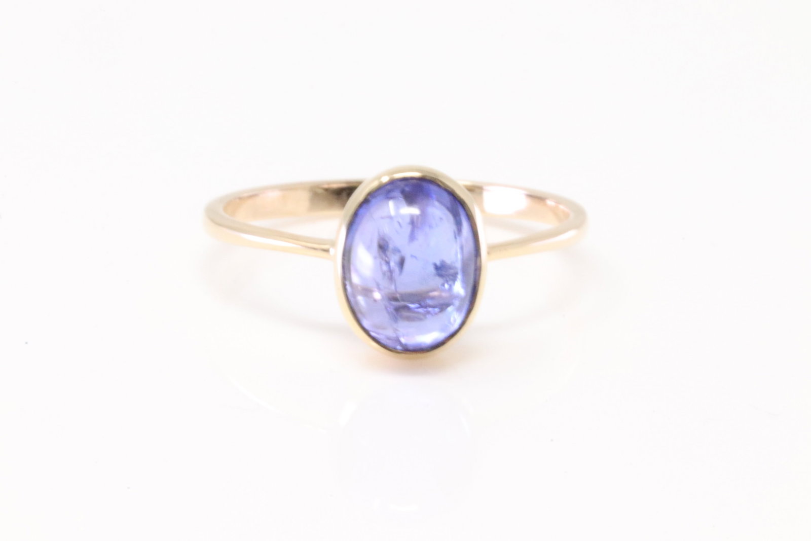 Tanzanite Gems Ring 14Kt.: 14Kt Yellow Gold Tanzanite Gems Ring. Ring has Oval Tanzanite Gems. Tanzanite weight: 2.11cts. Ring size: 6.25.