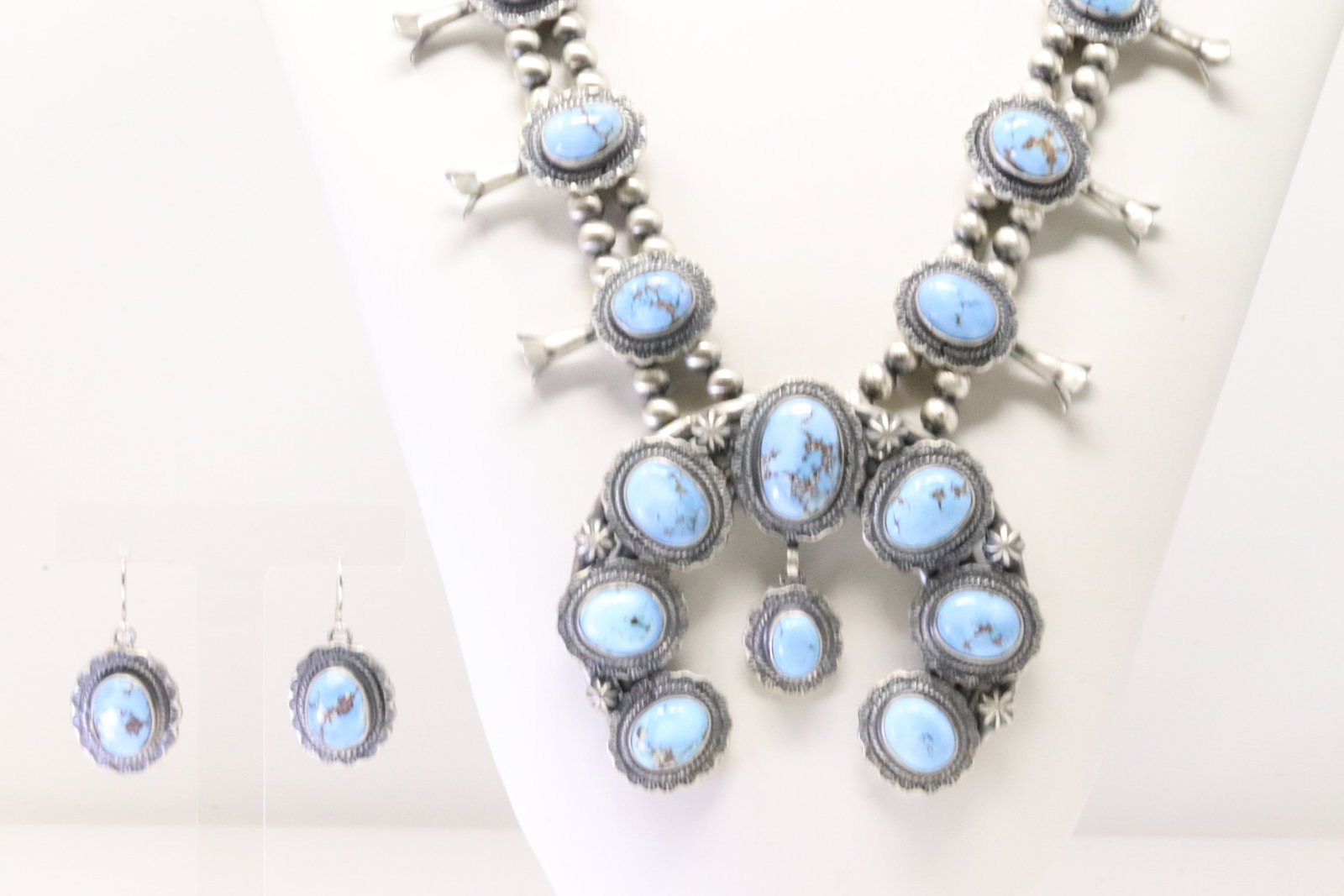 Native America Navajo Sterling Silver Golden Hill Turquoise Squash Blossom Necklace & Earring's Set: This is a Native America Navajo Sterling Silver Golden Hill Turquoise Squash Blossom Necklace & Earring's Set By Thomas Francisco. Necklace length: 28.00. Total weight: 233.50 Grams.