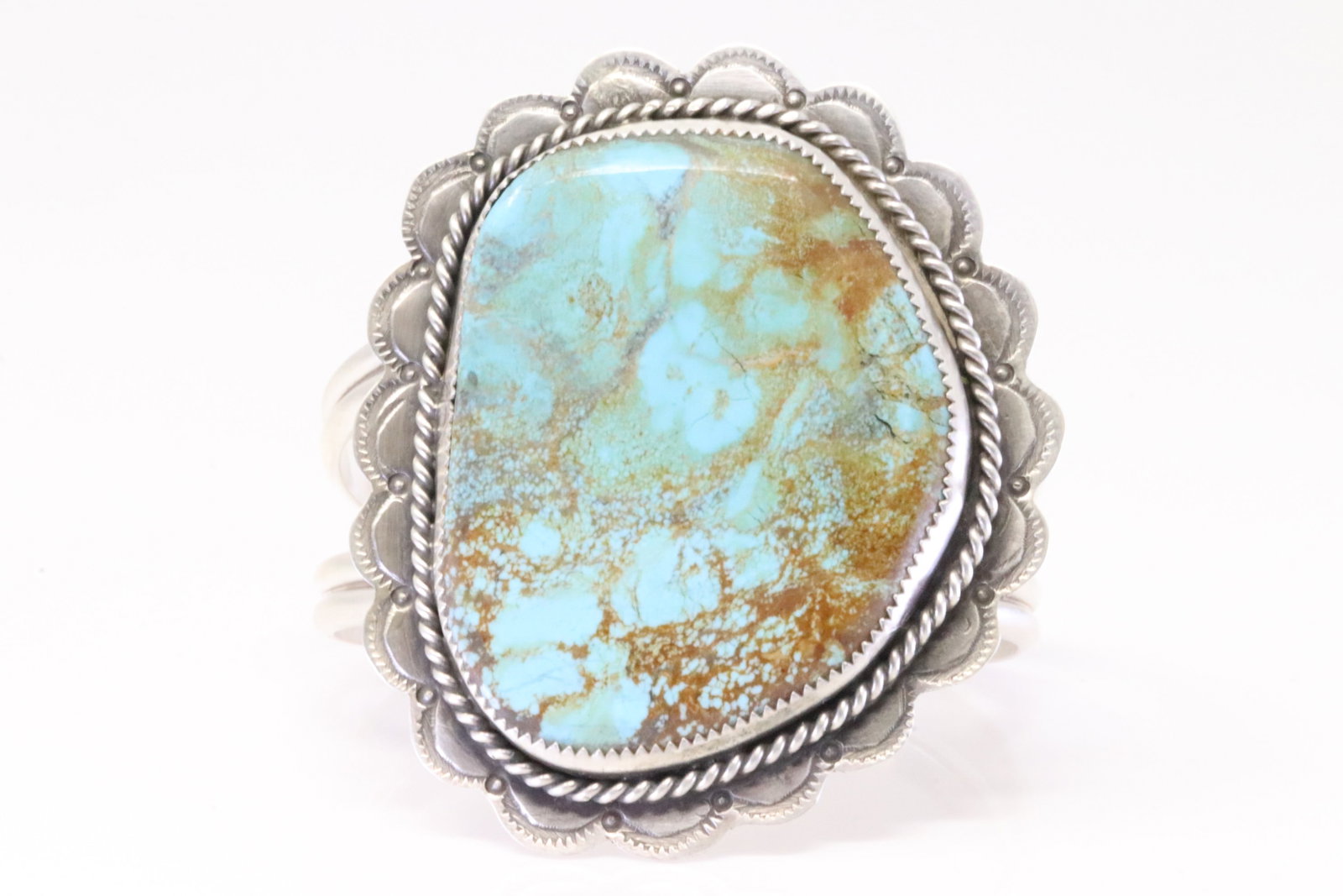 Native America Navajo Sterling Silver Turquoise Bracelet Cuff By Danny Hinio.: This is a Native America Navajo Sterling Silver Turquoise Bracelet Cuff By Danny Hinio. Total weight: 82.00 Grams.