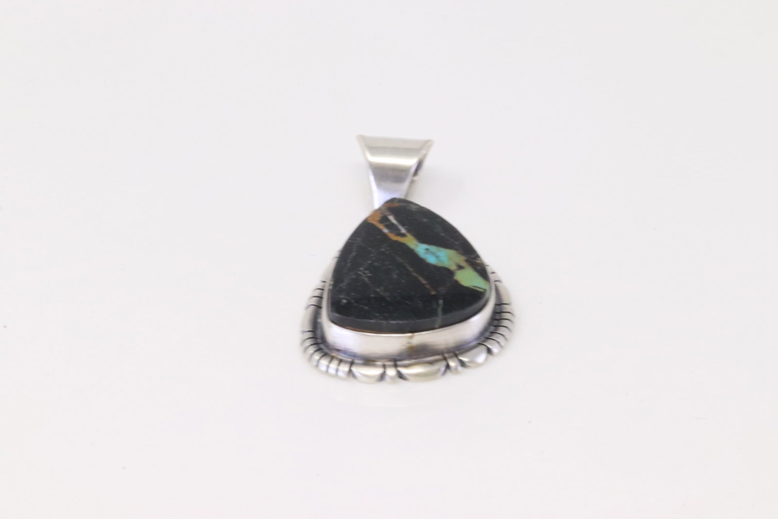 Native American Navajo Sterling Silver Black Jack Turquoise Pendant By T.F.: This is a Native American Navajo Sterling Silver Black Jack Turquoise Pendant By T.F.
