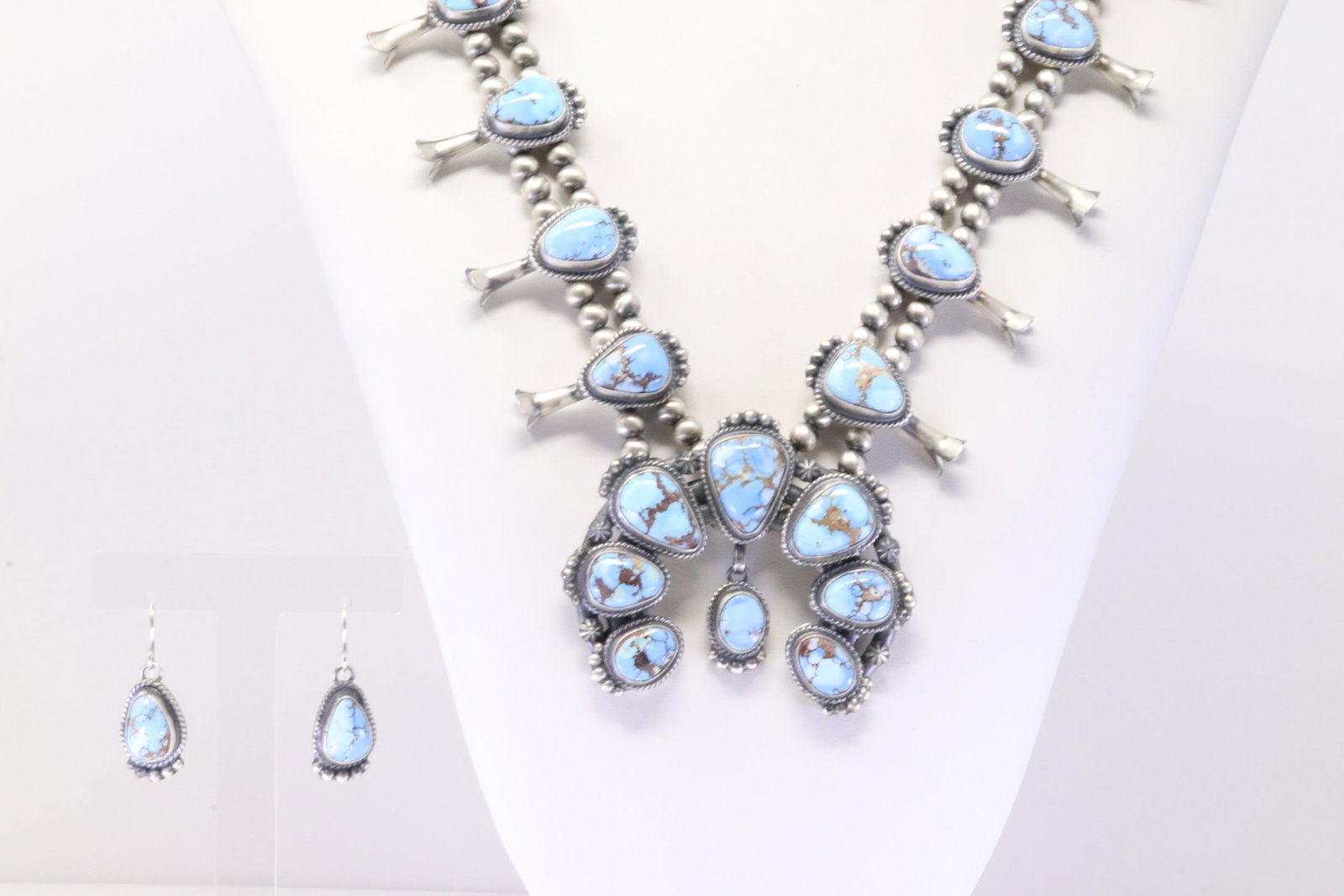 Native America Navajo Sterling Silver Golden Hill Turquoise Squash Blossom Necklace & Earring's Set: This is a Native America Navajo Sterling Silver Golden Hill Turquoise Squash Blossom Necklace & Earring's Set By Thomas Francisco. Necklace length: 26.00" Total weight: 168.10 Grams.