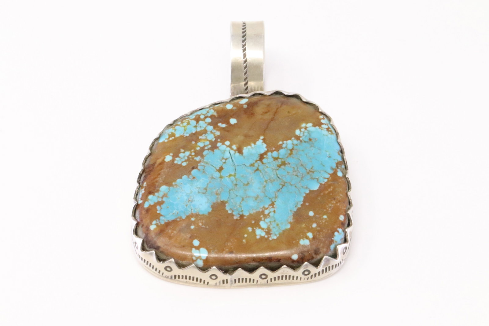 Native American Navajo Sterling Silver Number 8 Turquoise Pendant By Danny Henio.: This is a Native American Navajo Sterling Silver Number 8 Turquoise Pendant By Danny Henio. Pendant Turquoise Measure 1.5 inches length ,wide 1.5 inche. Total weight: 49.1 Grams.
