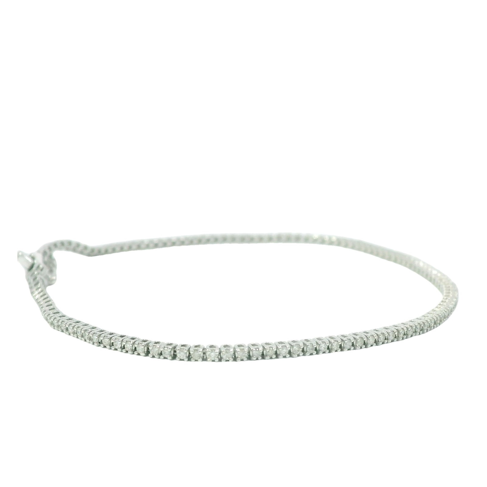 Diamond Tennis Bracelet 14Kt.: 14Kt White Gold Diamond Tennis Bracelet. Bracelet has round Brilliant Diamonds. Diamonds weight approx: 1.00cttw. Bracelet length: 7.00" Total weight: 3.40 Grams.