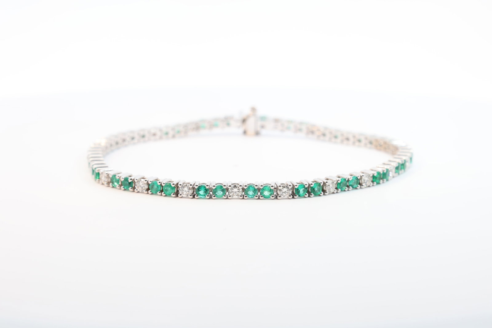 Emerald & Diamond Tennis Bracelet 18Kt.: 18Kt White Gold Emerald & Diamond Tennis Bracelet. Bracelet has 43 Eemrald's Gems with 20 round Brlliants Diamonds. Diamonds weight:approx 1.00 ctw & Emrald approx weight is 1.25 ctw Bracelet length: 