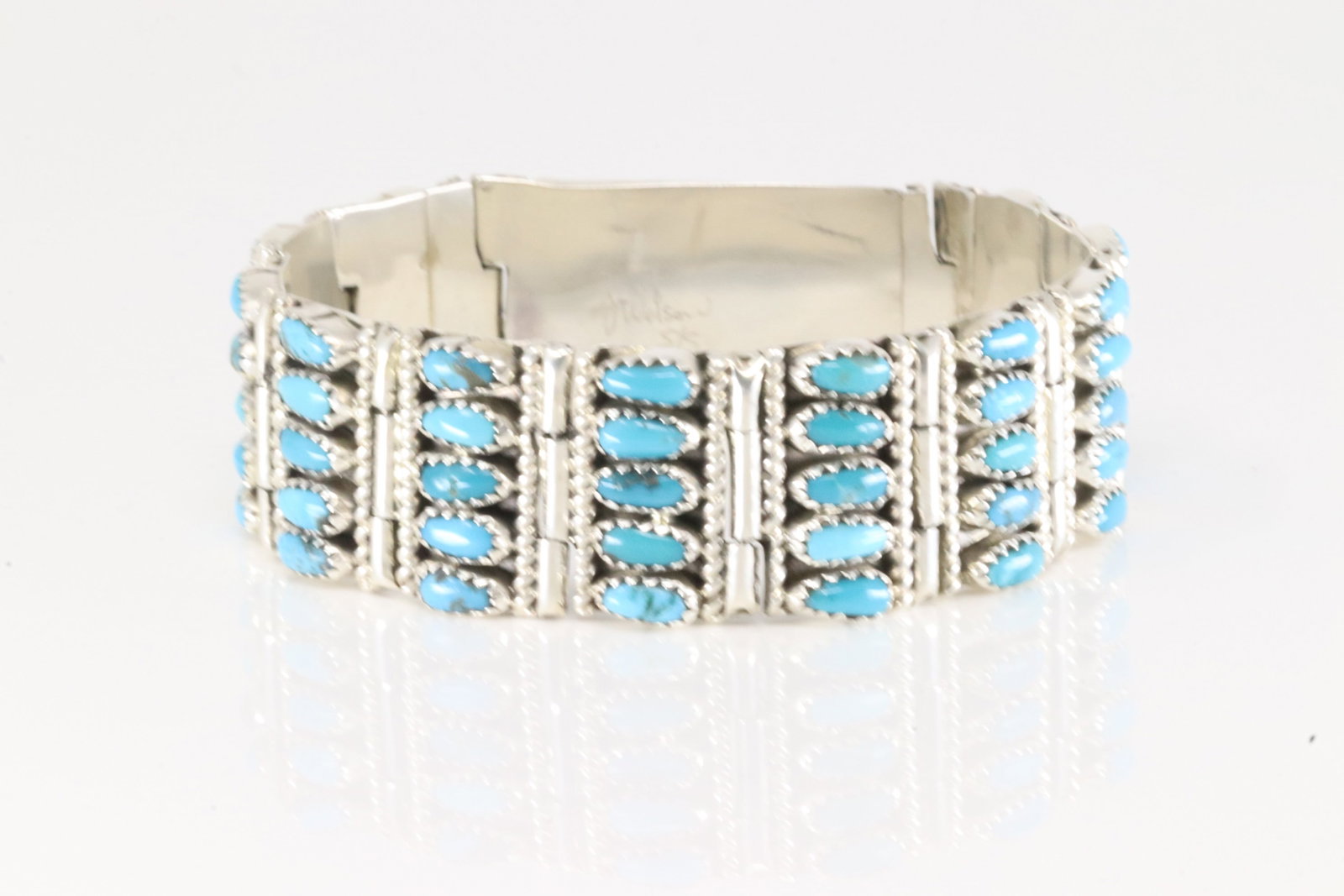 Native America Navajo Sterling Silver Turquoise Bracelet Cuff By Wilson.: This is a Native America Navajo Sterling Silver Turquoise Bracelet Cuff By Wilson. Bracelet length: 8.00"
