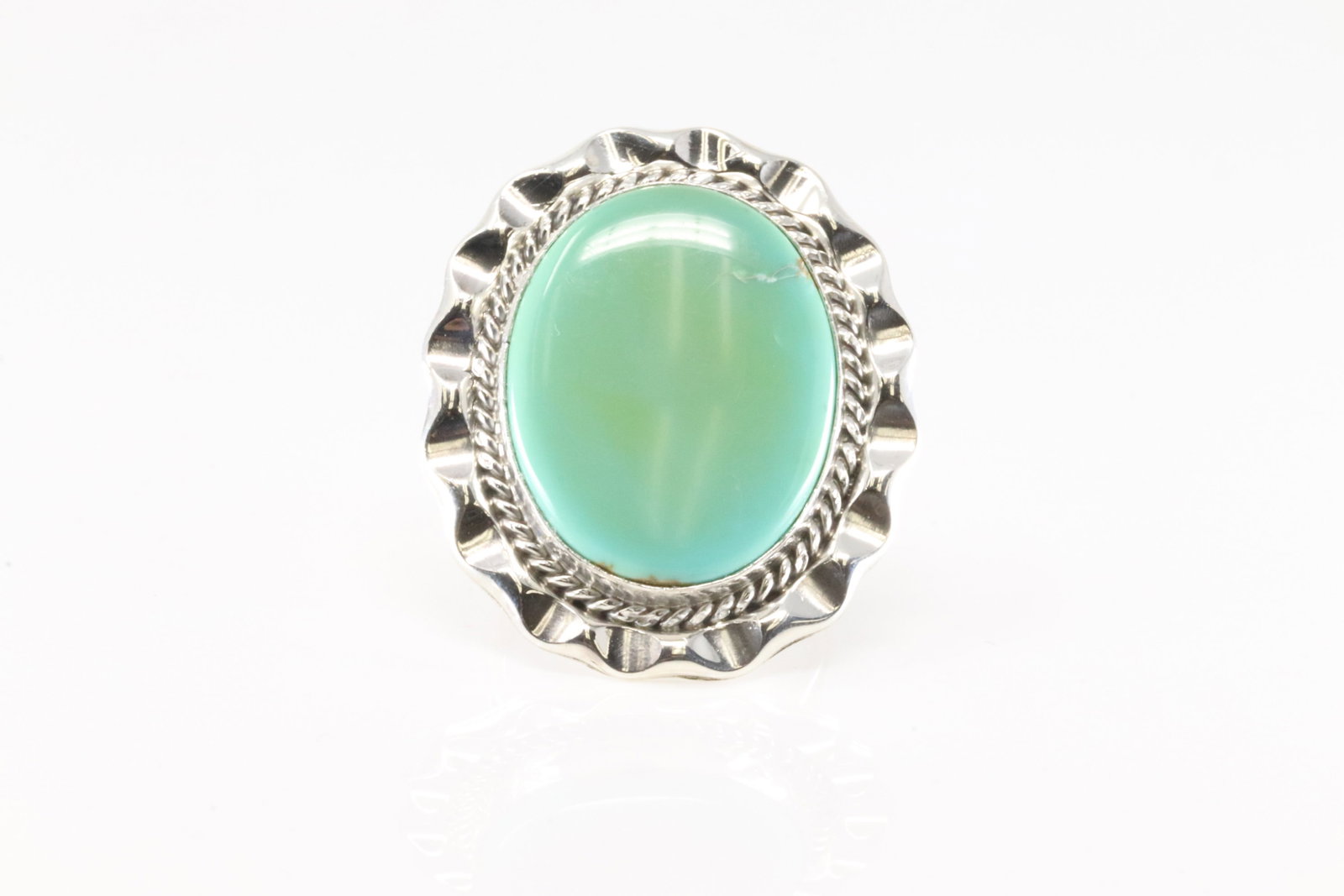 Native America Navajo Sterling Silver Turquoise Ring By Samuel Yellowhair.: This is a Native America Navajo Sterling Silver Turquoise Ring By Samuel Yellowhair. Ring size: 6.50.