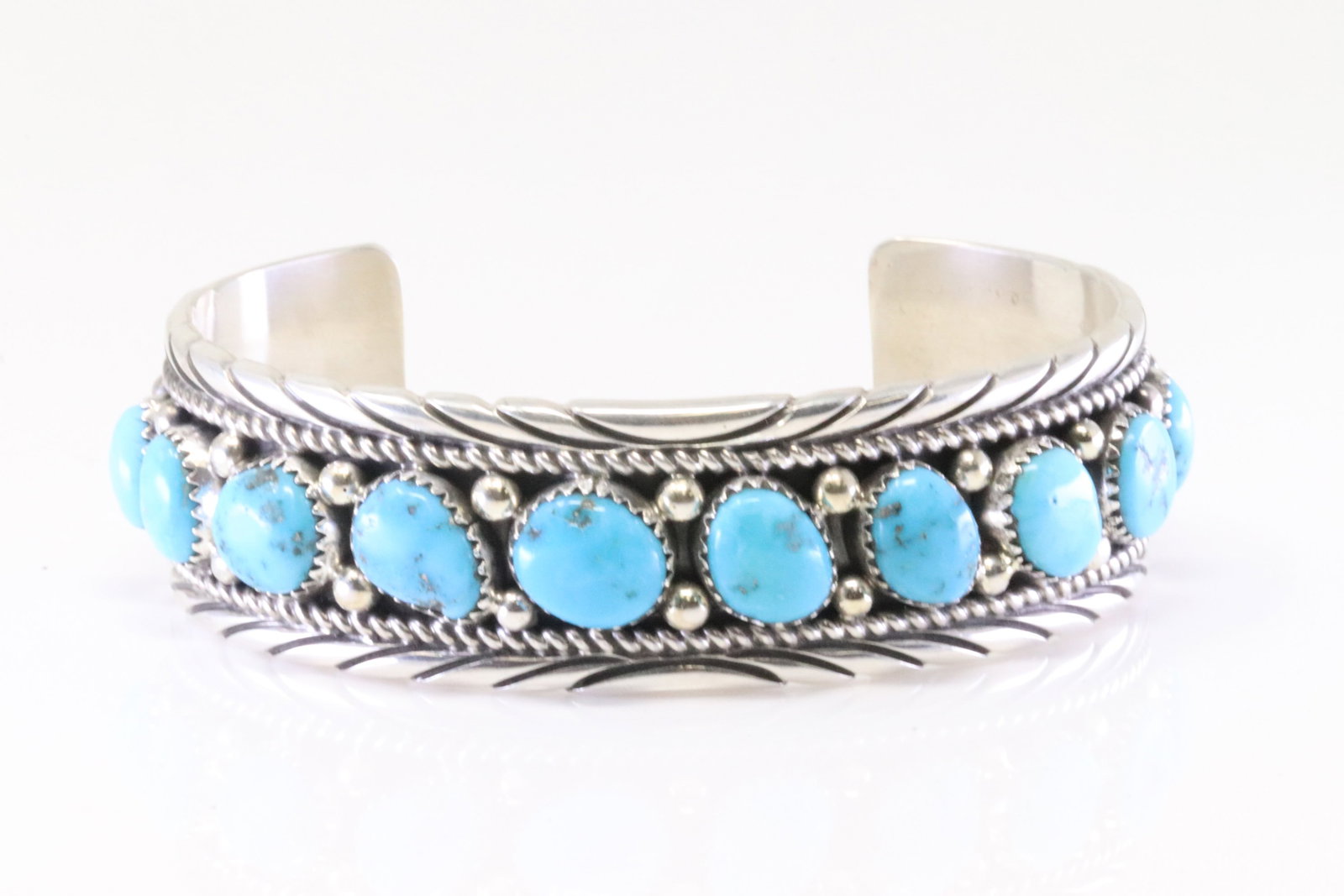 Native America Navajo Sterling Silver Kingman Turquoise Bracelet By Calvin James.: This is a Native America Navajo Sterling Silver Kingman Turquoise Bracelet By Calvin James.