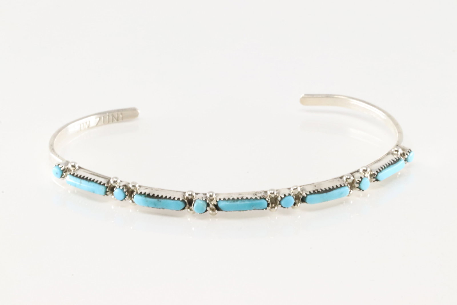 Native America Zuni Sterling Silver Turquoise Bracelet Cuff By JW.: This is a Native America Zuni Sterling Silver Turquoise Bracelet Cuff By JW.