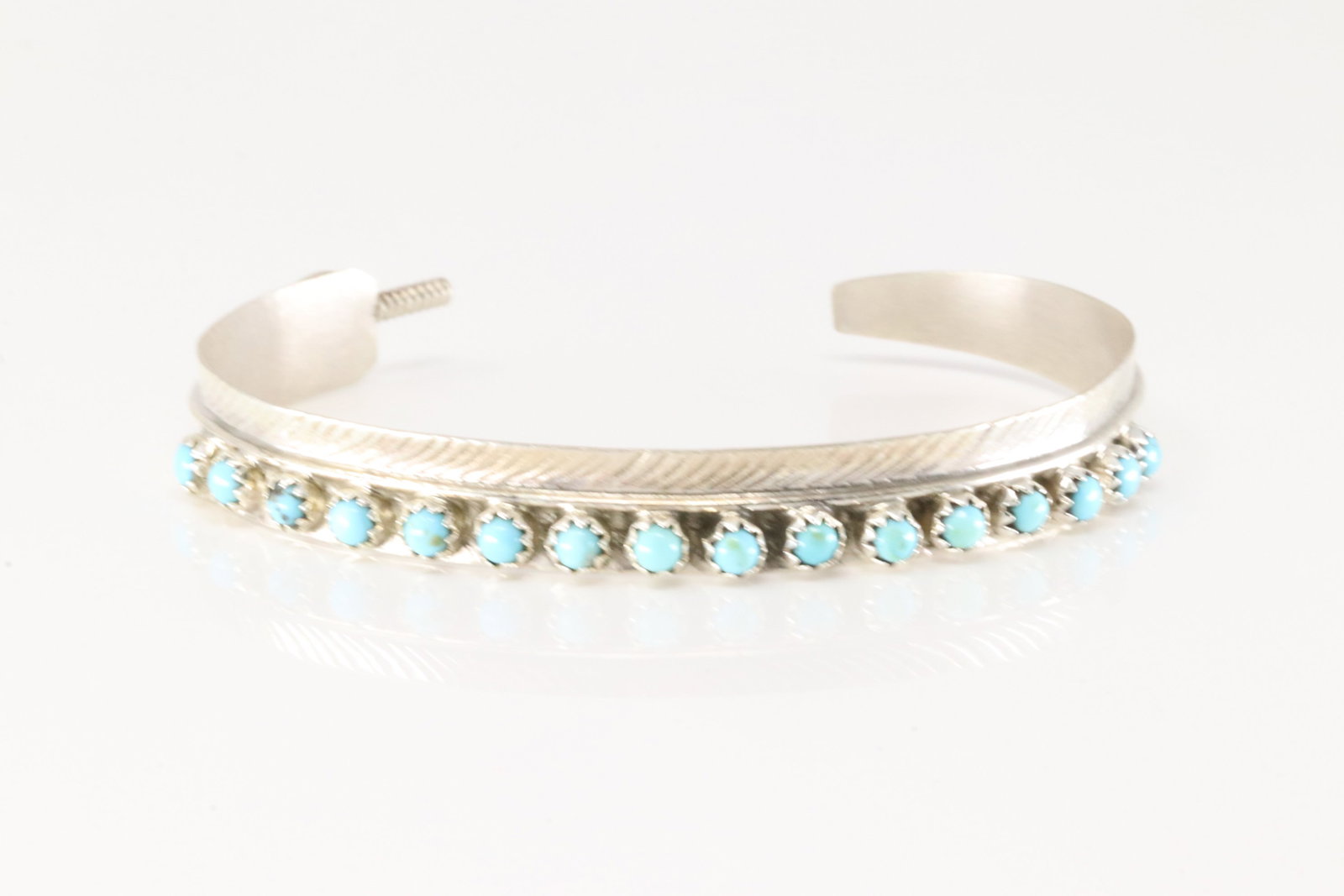 Native American Navajo Sterling Silver Turquoise Feather Bracelet By Aaron Davis.: This is a Native American Navajo Sterling Silver Turquoise Feather Bracelet By Aaron Davis.