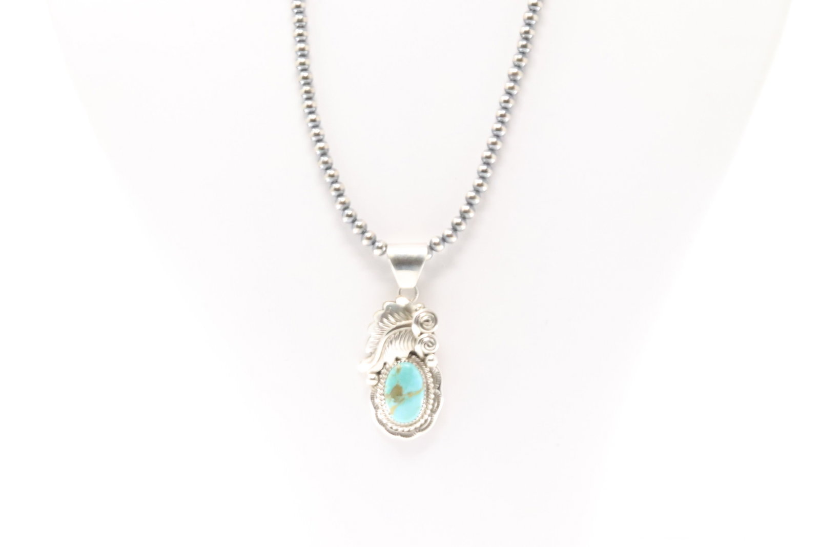 Native America Navajo Sterling Silver Kingman Turquoise Pendant By Julia Ettcity. With Pearl Beaded: This is a Native America Navajo Sterling Silver Kingman Turquoise Pendant By Julia Ettcity. With Pearl Beaded Sterling Silver Machine Made Necklace. Necklace length: 18.00"