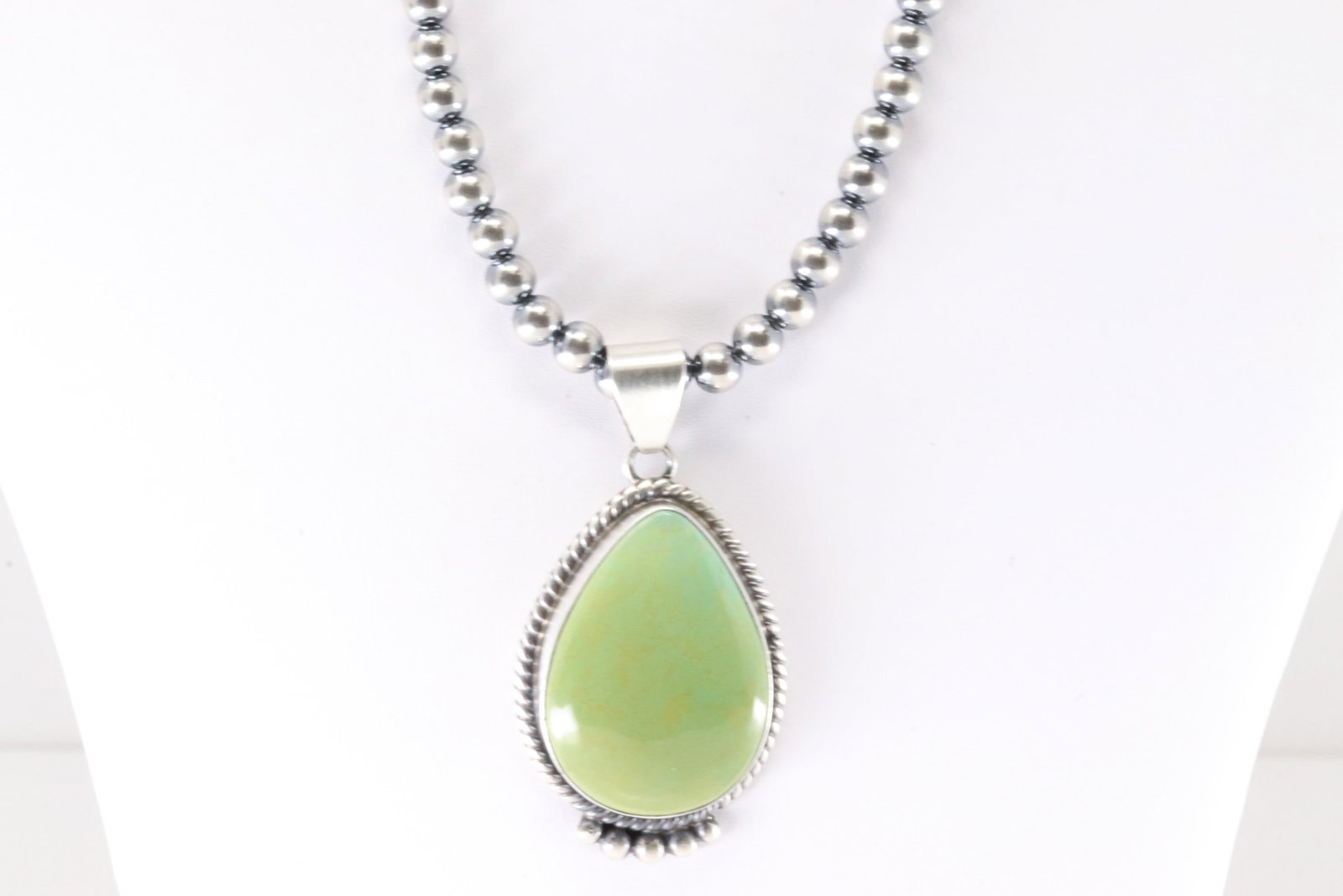 Native America Navajo Sterling Silver Kingman Turquoise Pendant By Judith Dixon. With Pearl Beaded: This is a Native America Navajo Sterling Silver Kingman Turquoise Pendant By Judith Dixon. With Pearl Beaded Sterling Silver Machine Made Necklace. Necklace length: 18.00"