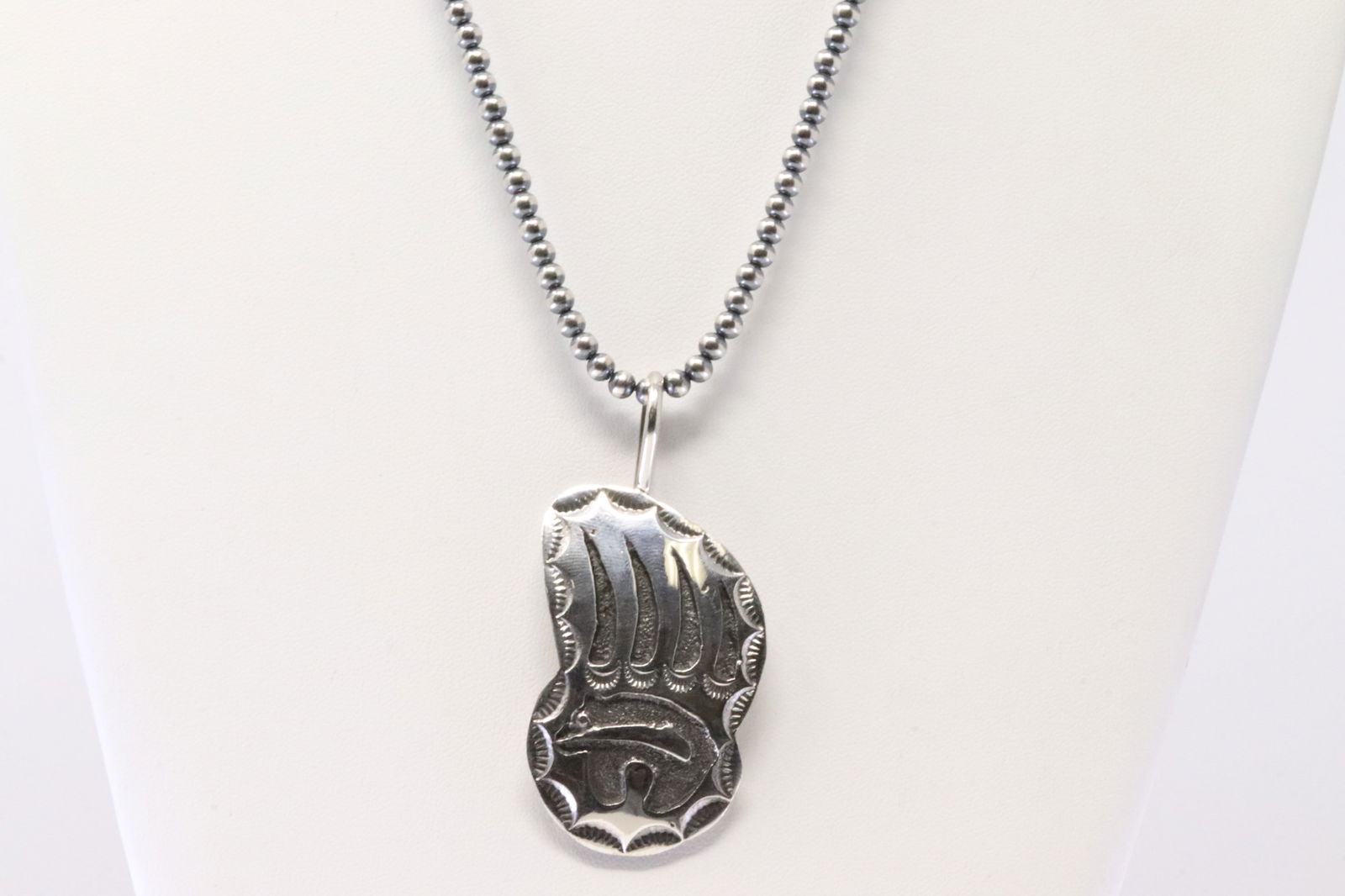 Native America Navajo Sterling Silver Bear Paw Pendant By Emerson Kinsel. With Pearl Beaded Sterling: This is a Native America Navajo Sterling Silver Bear Paw Pendant By Emerson Kinsel. With Pearl Beaded Sterling Silver Machine Made Necklace. Necklace length: 20.00"