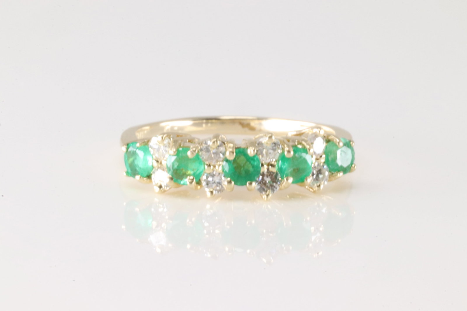 Emerald & Diamond Ring 14Kt.: Ladies 14Kt Yellow Gold Eemrald & Diamond Ring. Ring has 5 Round Emeralds with 8 round diamonds. Diamonds weight approx: 0.35ctw. Ring size: Total weight: 2.10 Grams.