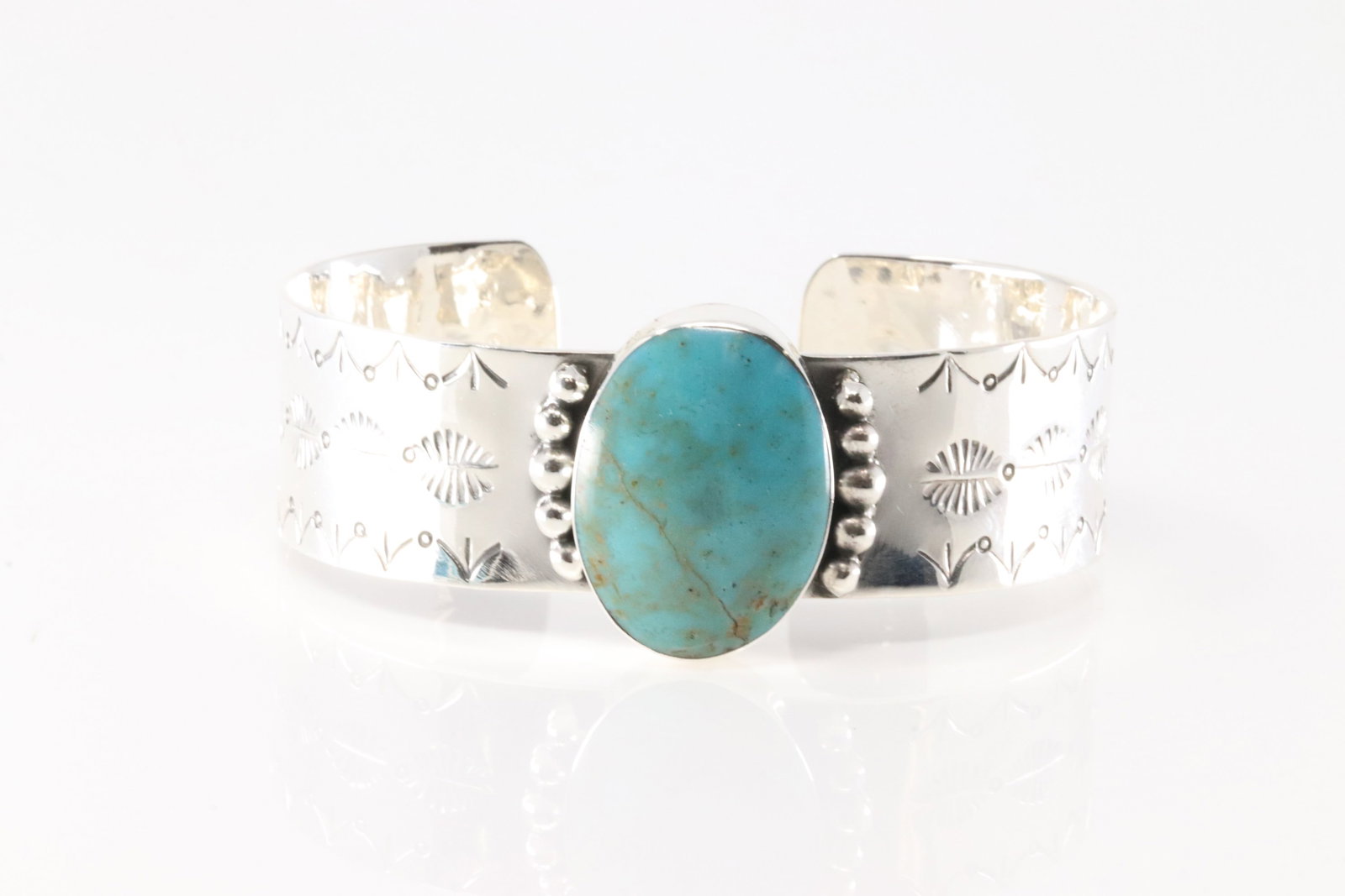 Native America Navajo Sterling Silver Turquoise Bracelet Cuff By Daniel Dakai.: This is a Native America Navajo Sterling Silver Turquoise Bracelet Cuff By Daniel Dakai.